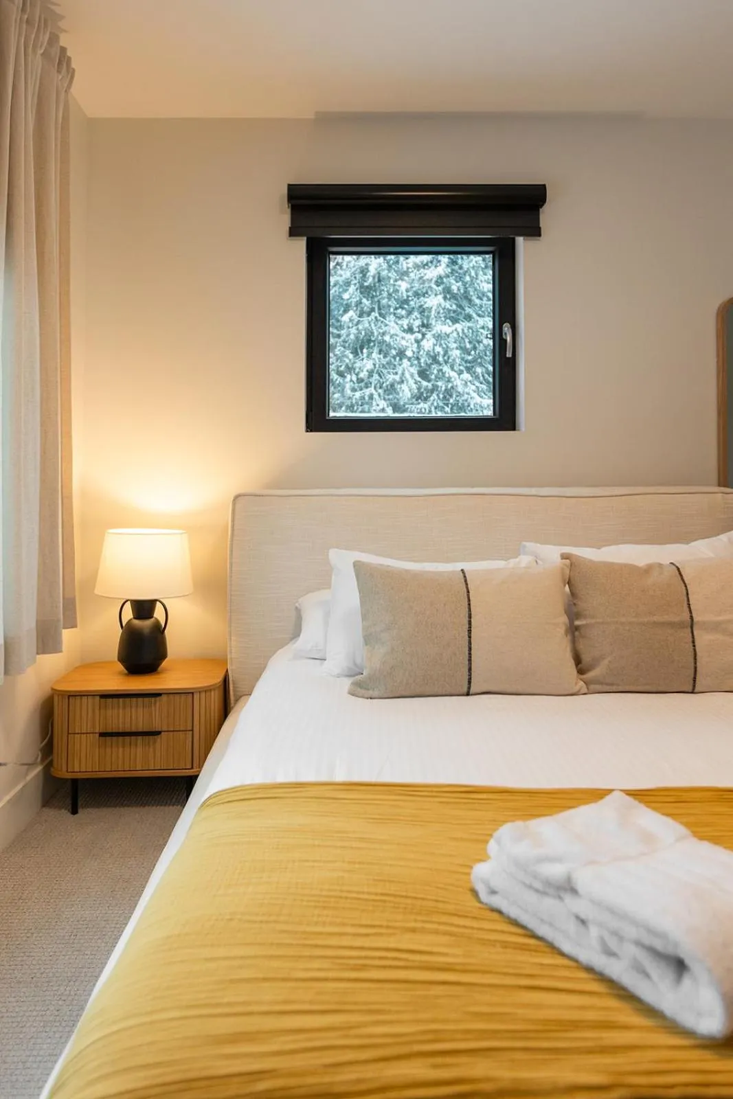 Bed in Tally Ho by Revelstoke Vacations