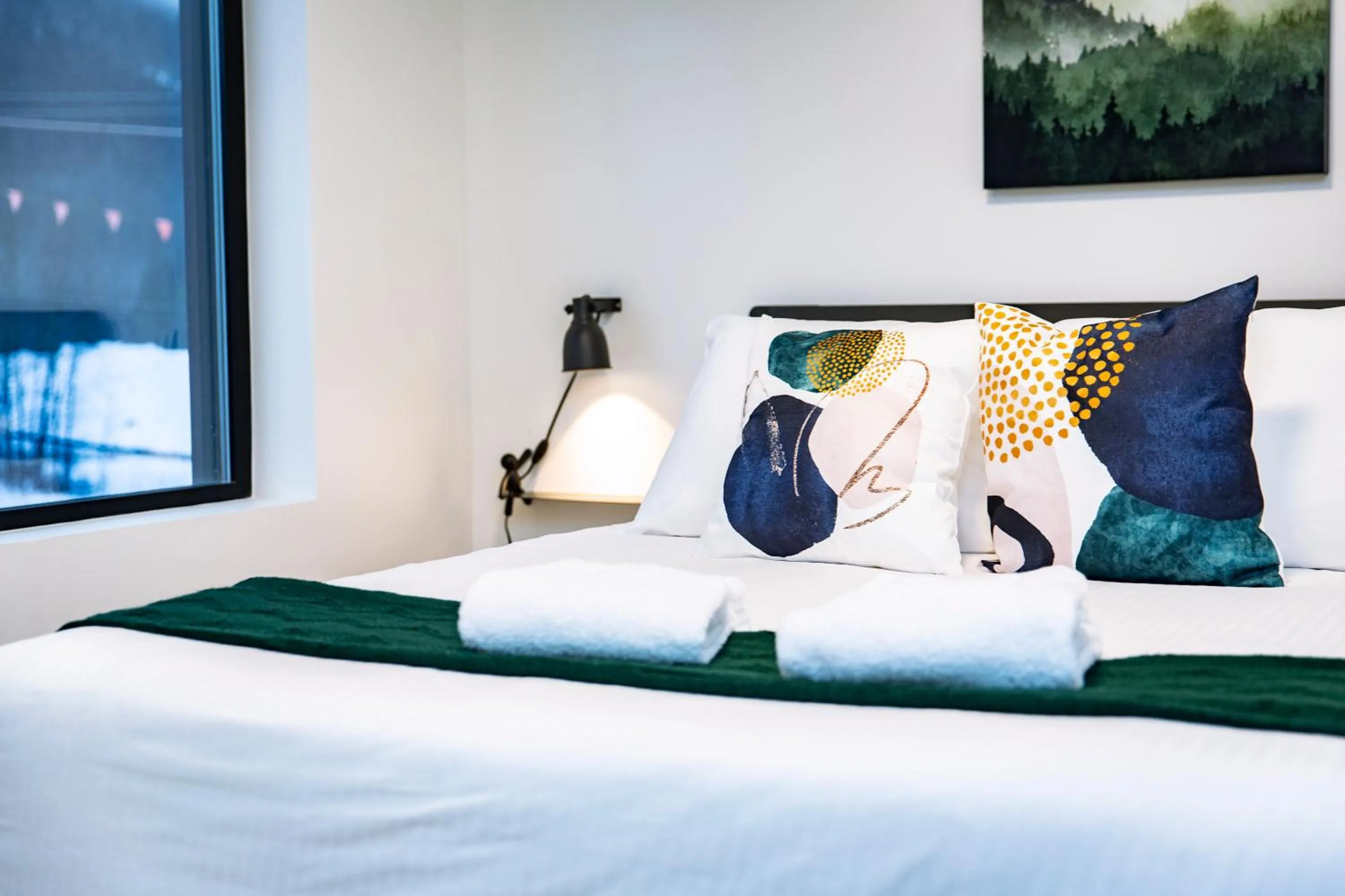 Bed in Separate Reality Retreat by Revelstoke Vacations