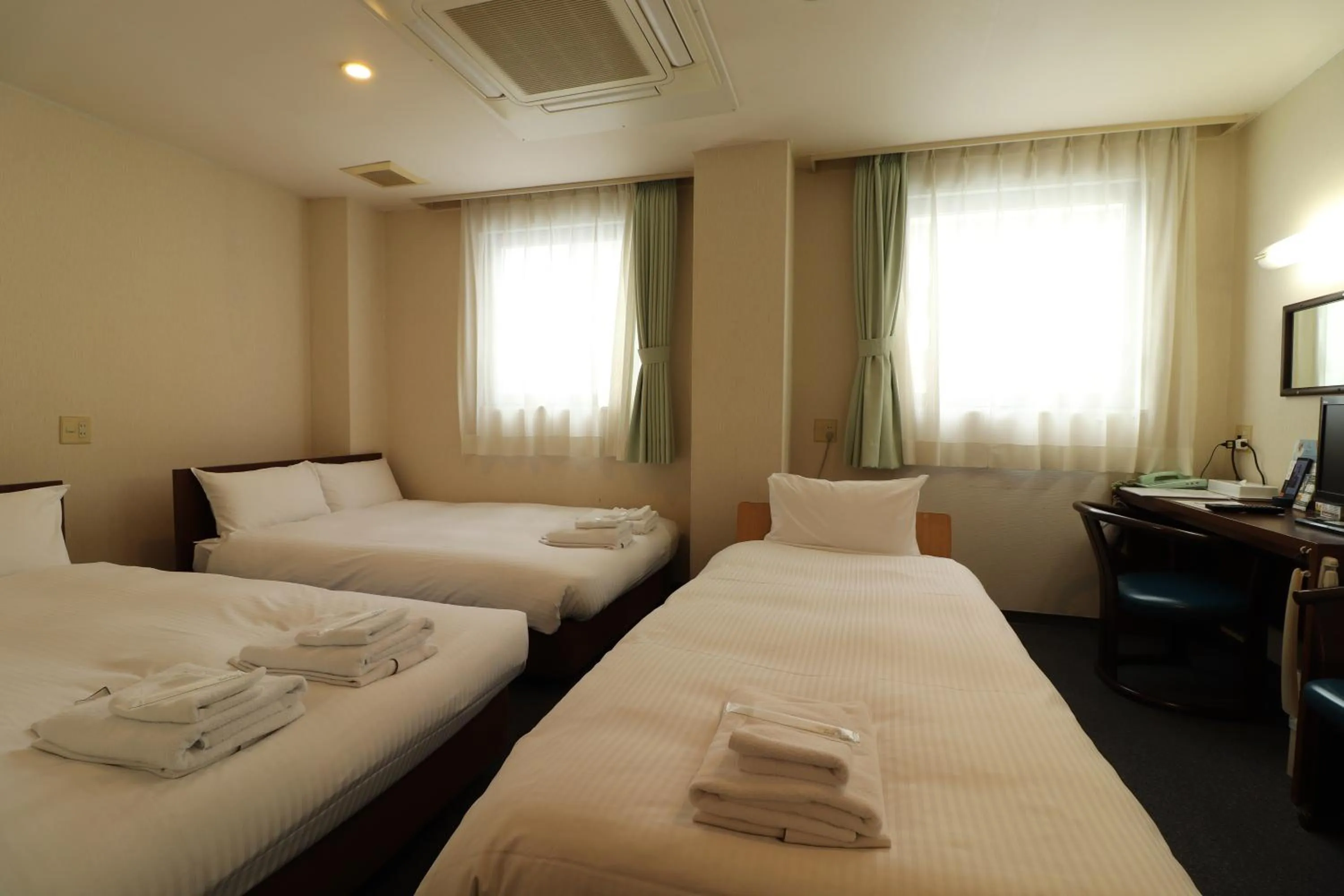 Bed in Hotel Green Arbor