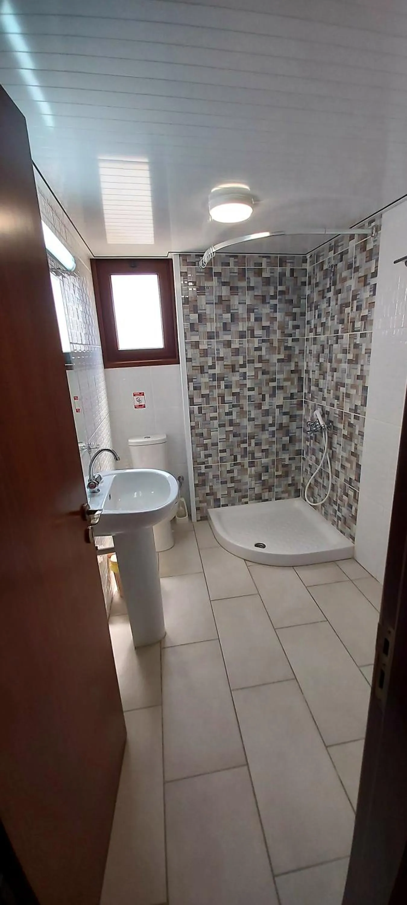 Bathroom in Lakis Court