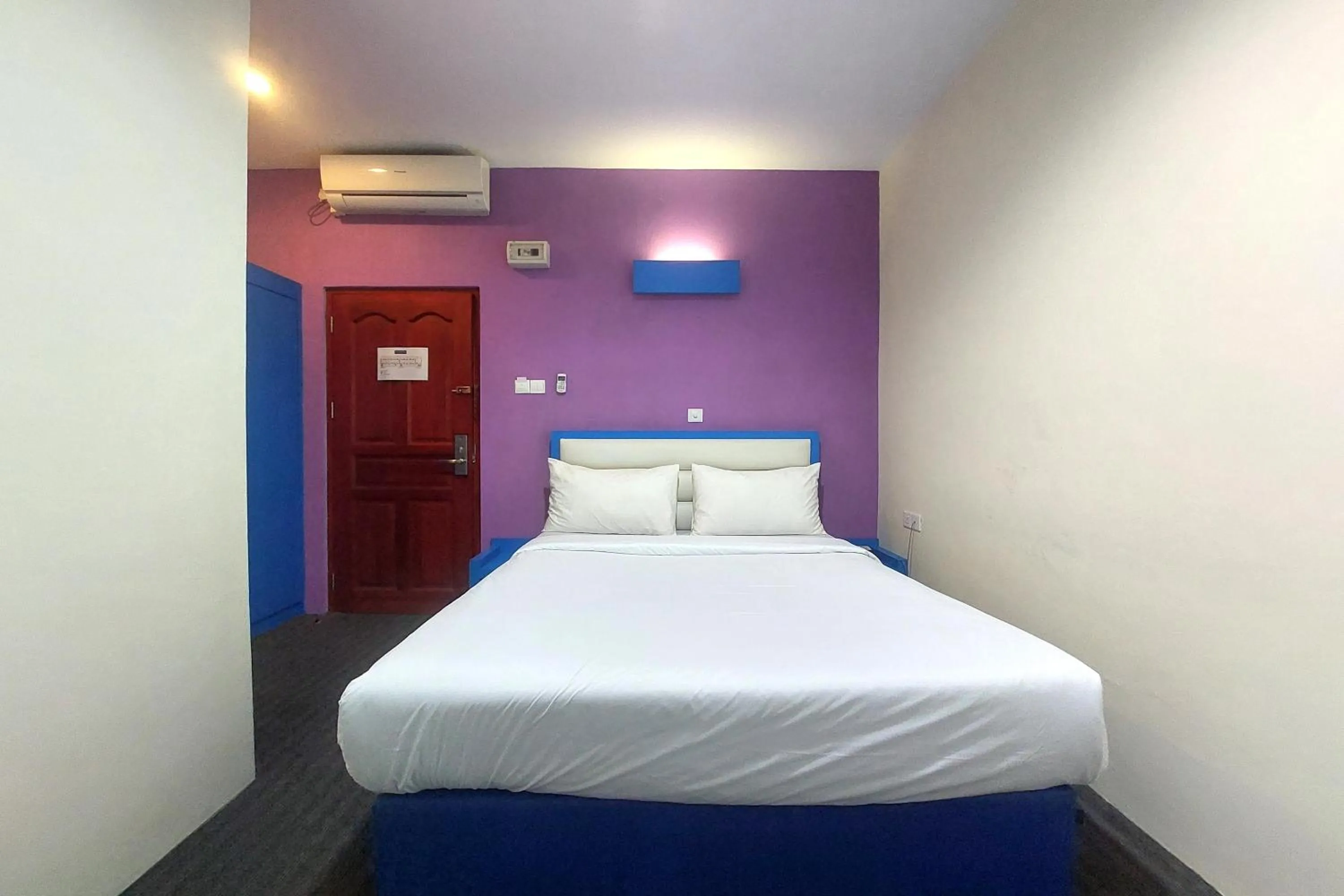 Bedroom in D'MERLION HOTEL