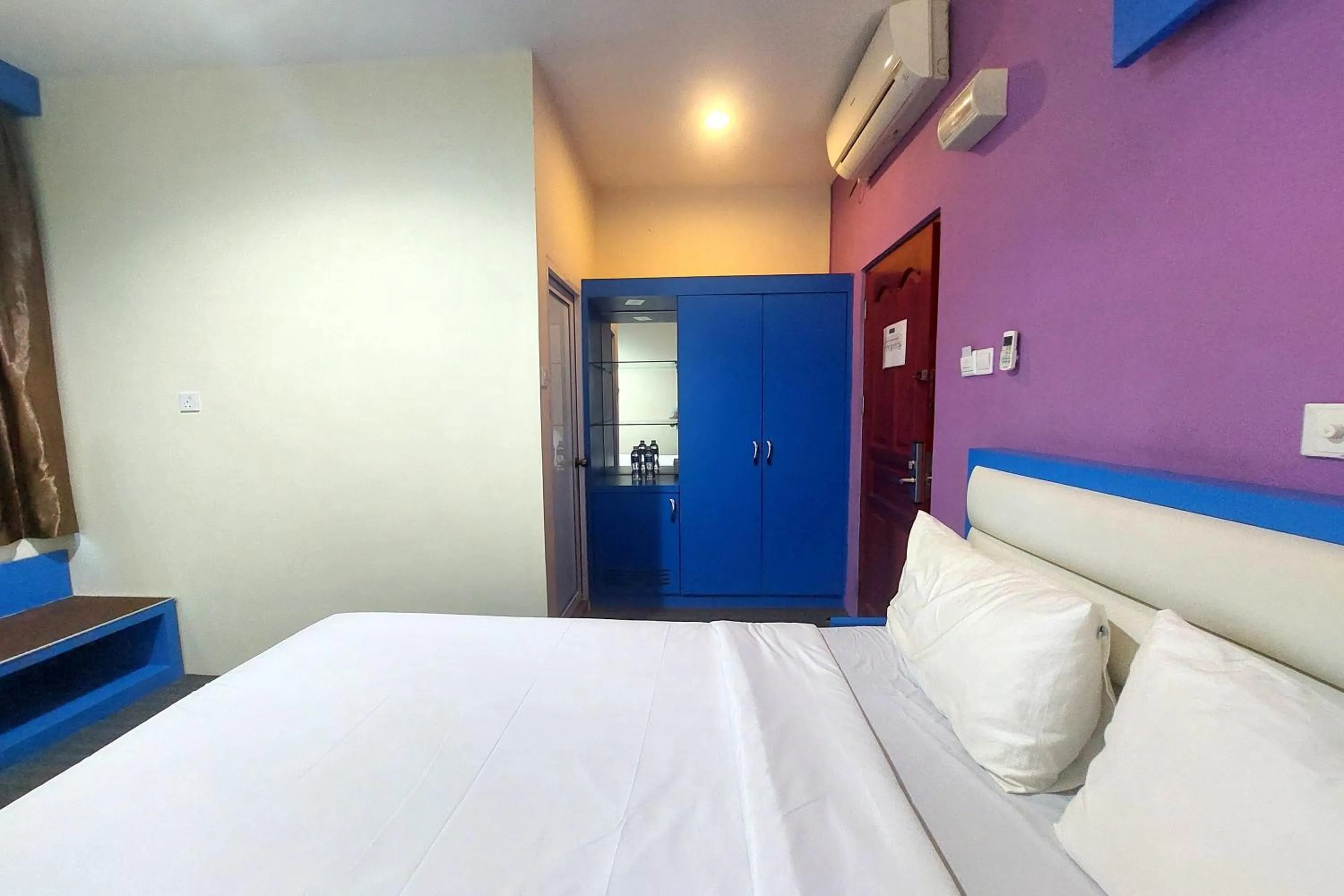 Bedroom in D'MERLION HOTEL