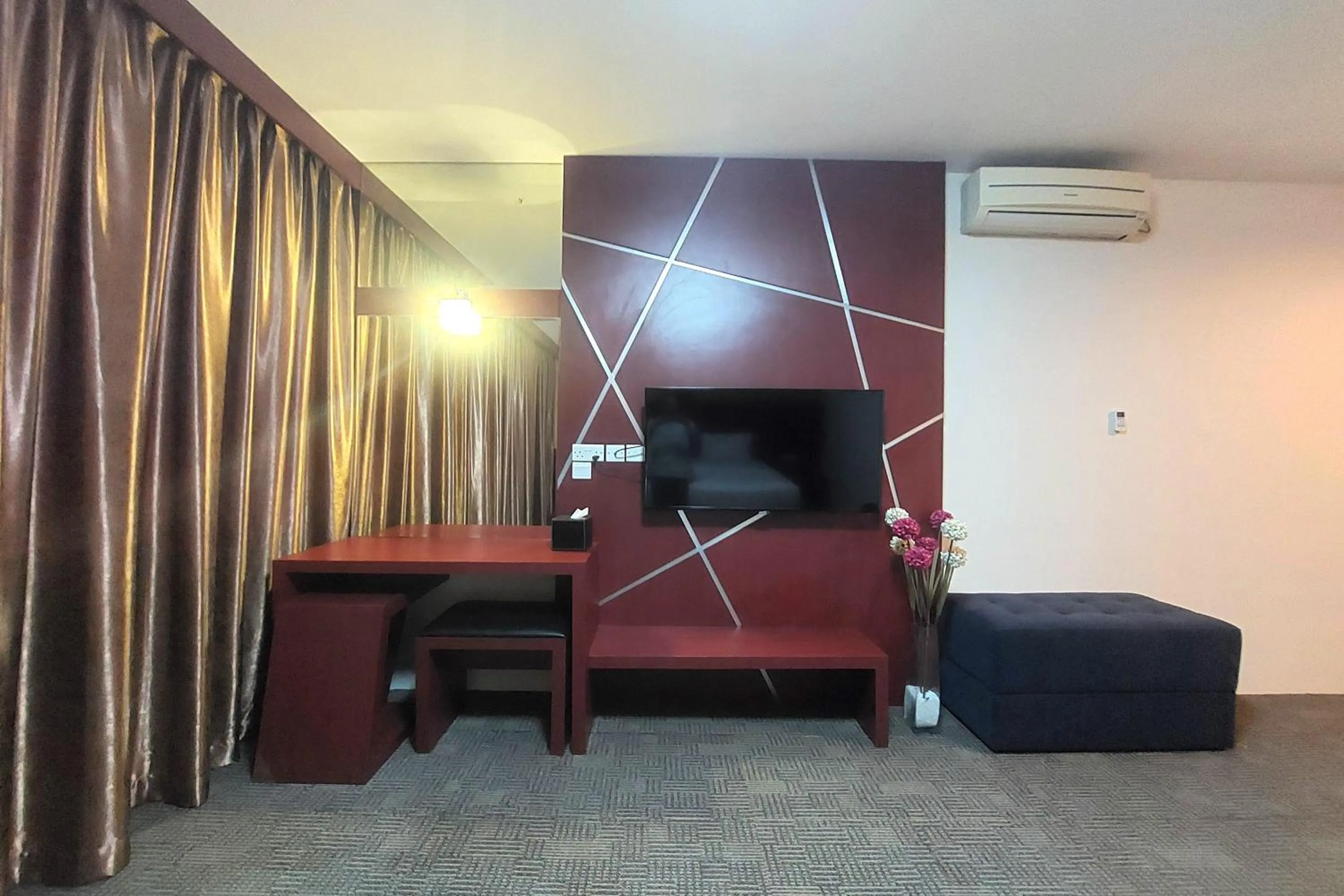 Bedroom in D'MERLION HOTEL