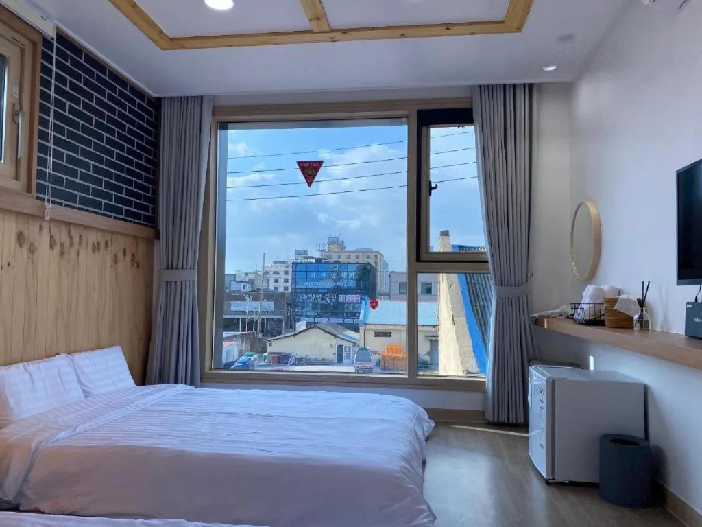 Bed in 38th Street Guesthouse