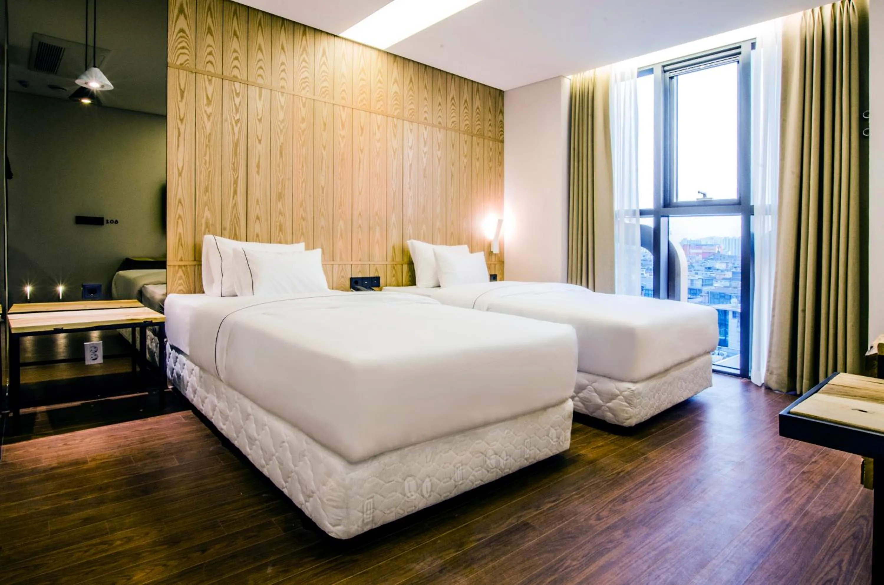 Bed in Hotel The Designers Premier Kondae