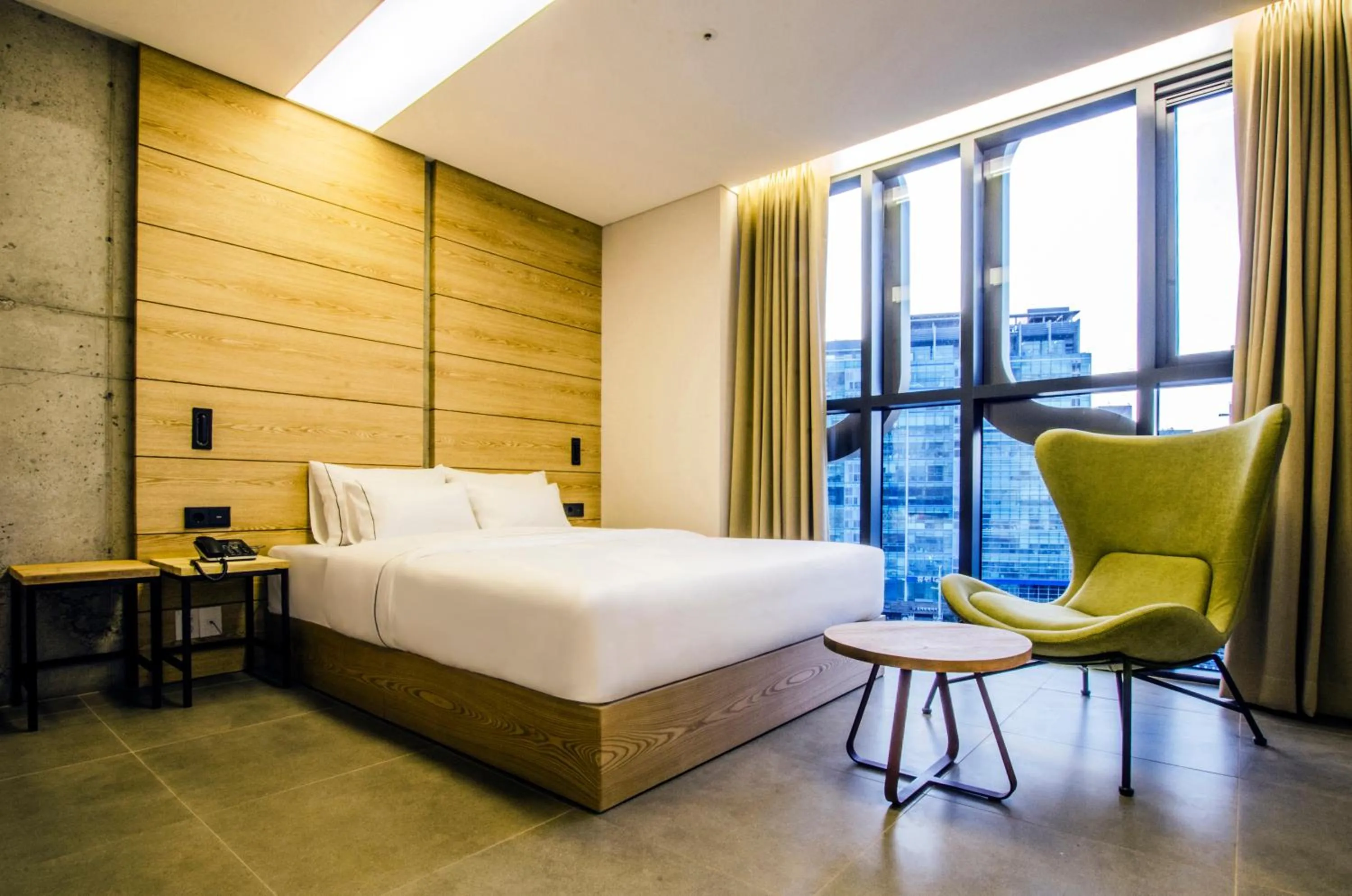 Bed in Hotel The Designers Premier Kondae