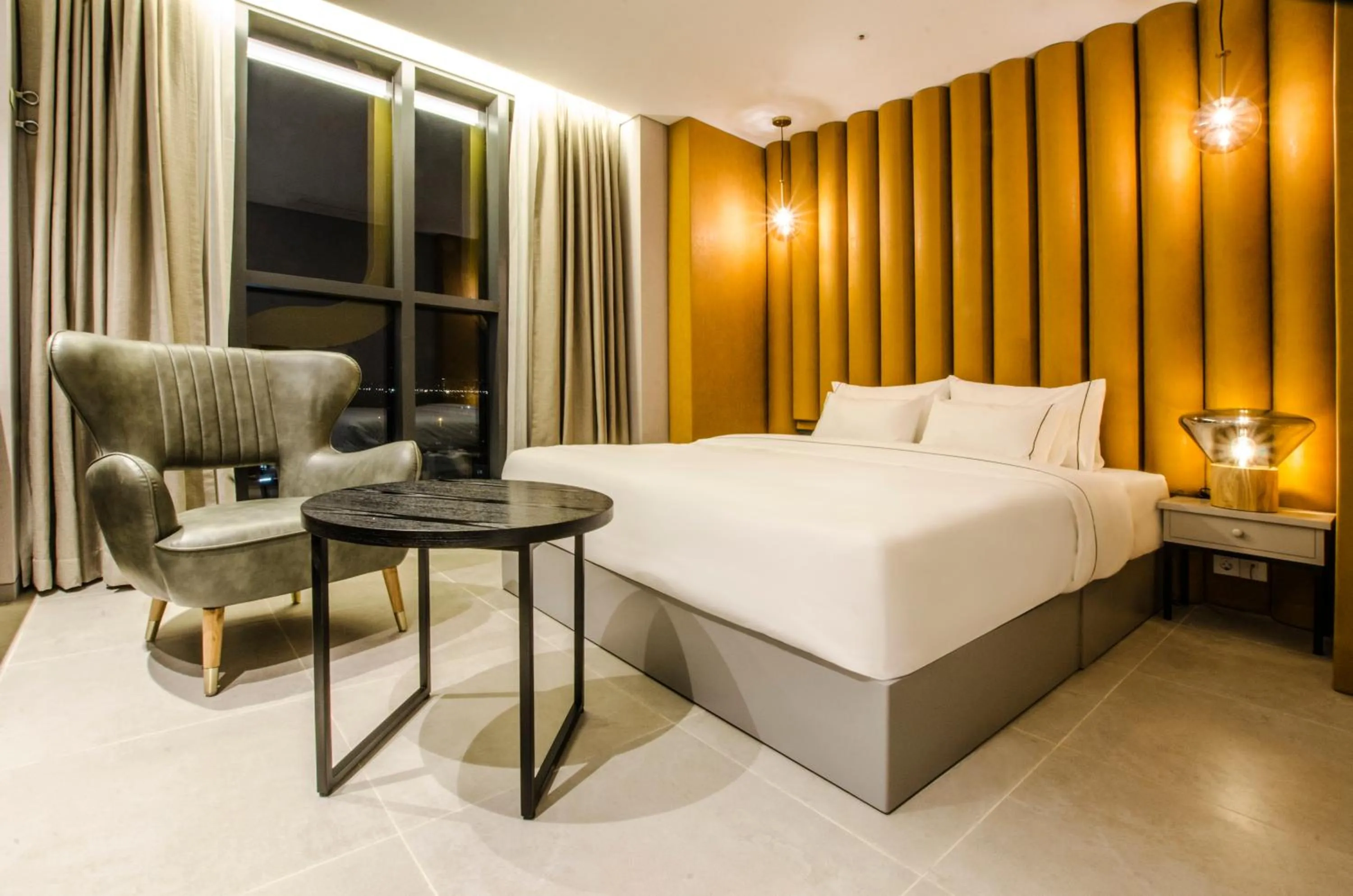 Bed in Hotel The Designers Premier Kondae