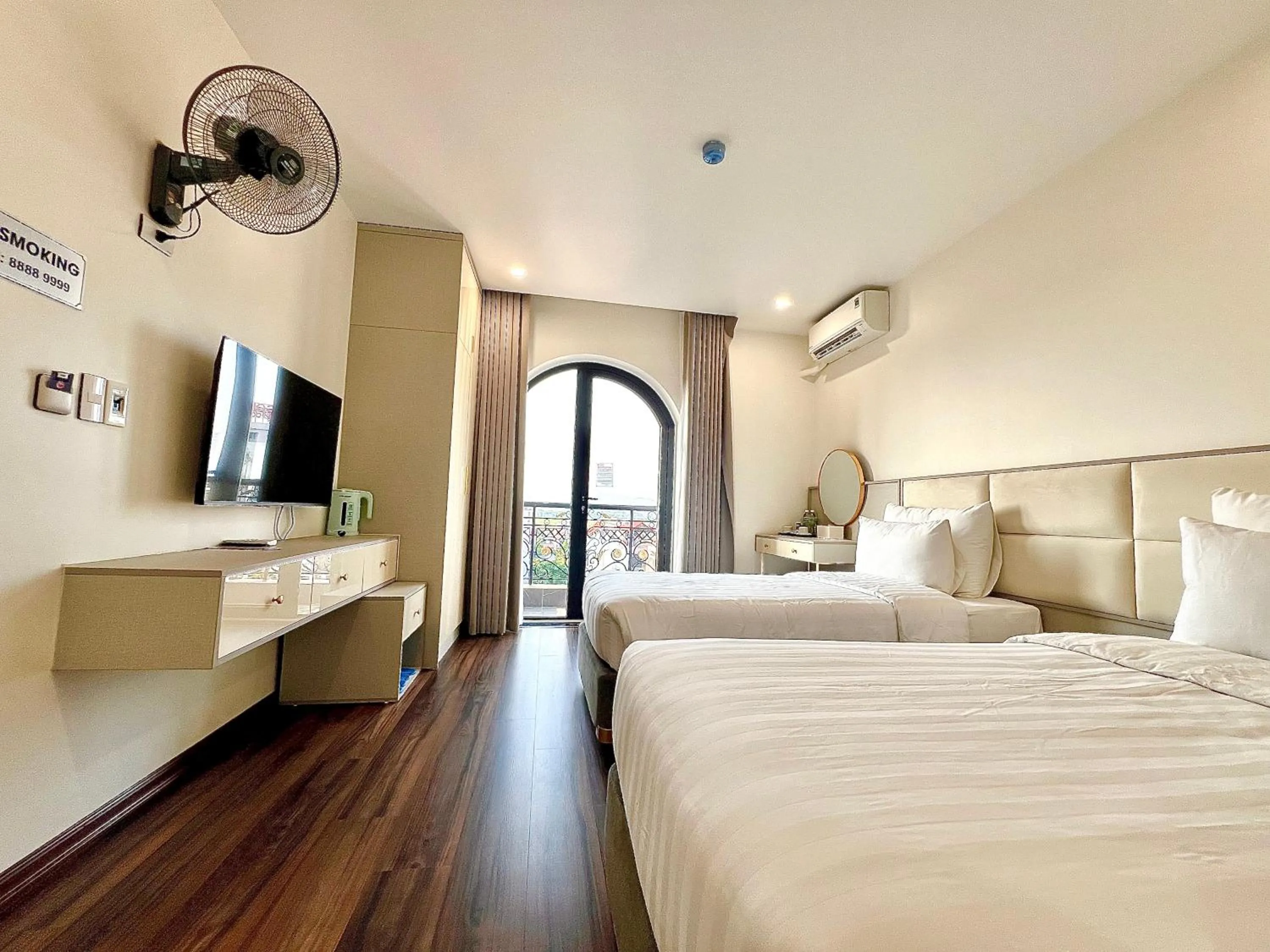 Bed in Grand Dragon Noi Bai Hotel