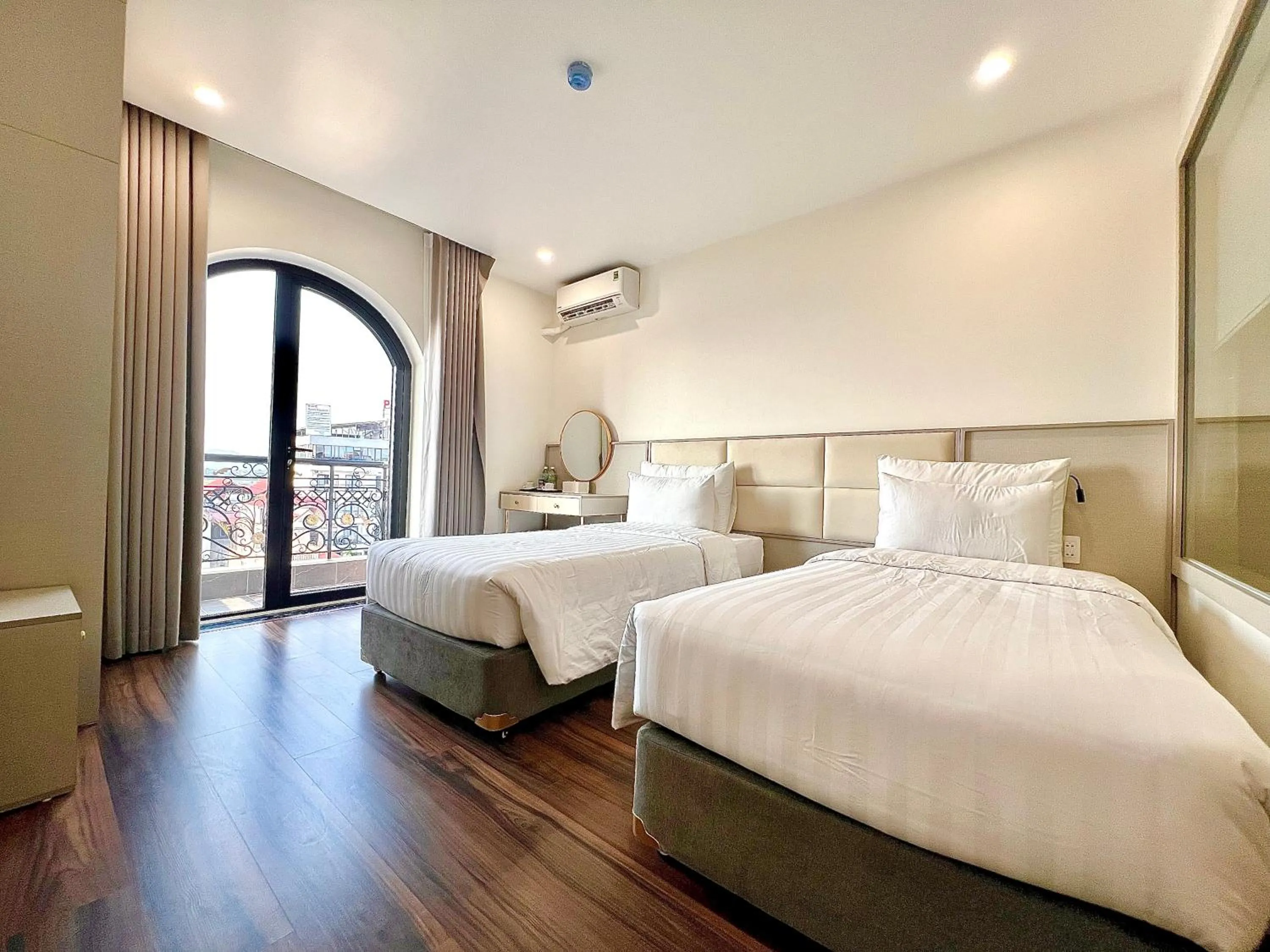 Bed in Grand Dragon Noi Bai Hotel