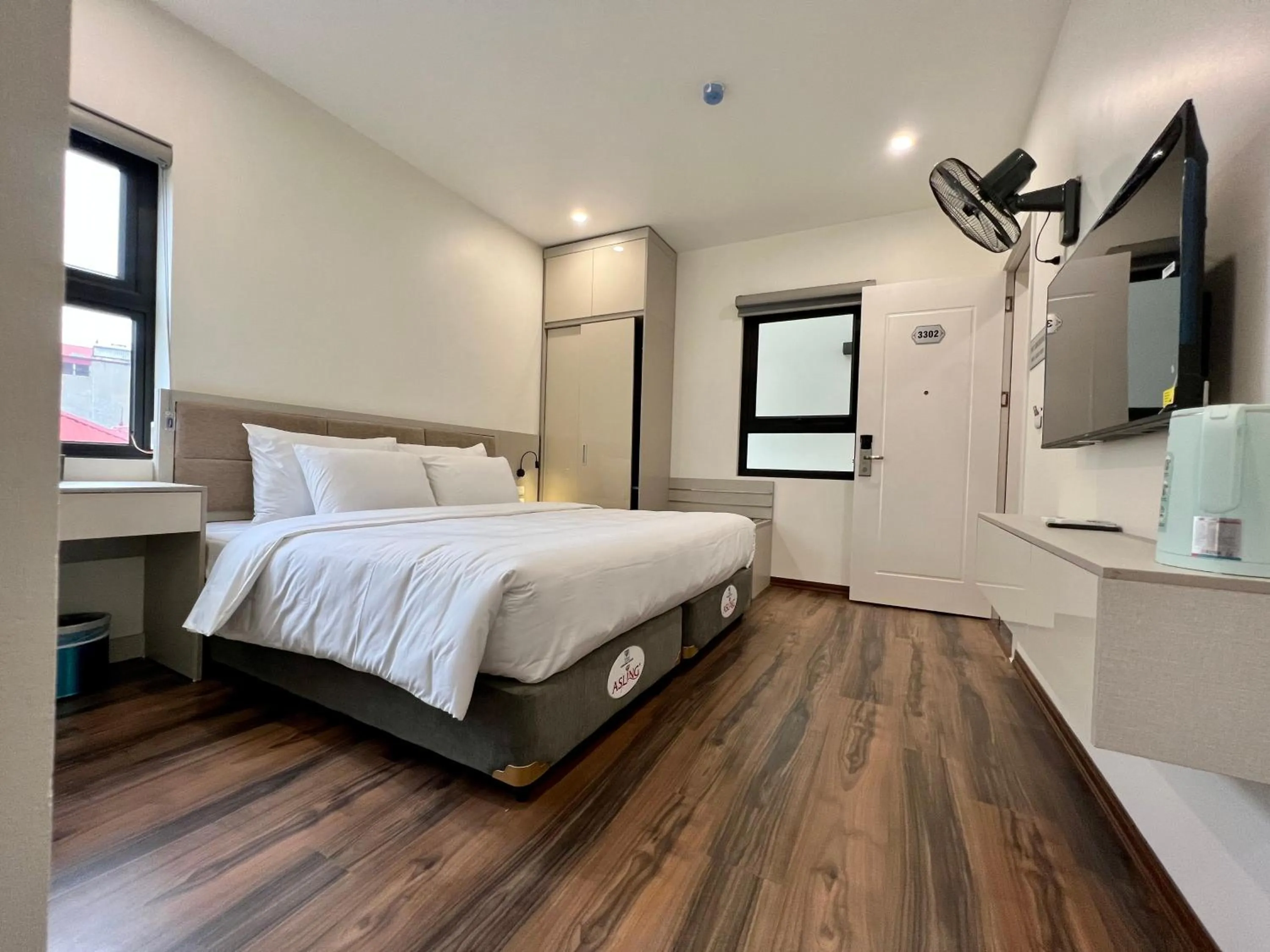 Bed in Grand Dragon Noi Bai Hotel