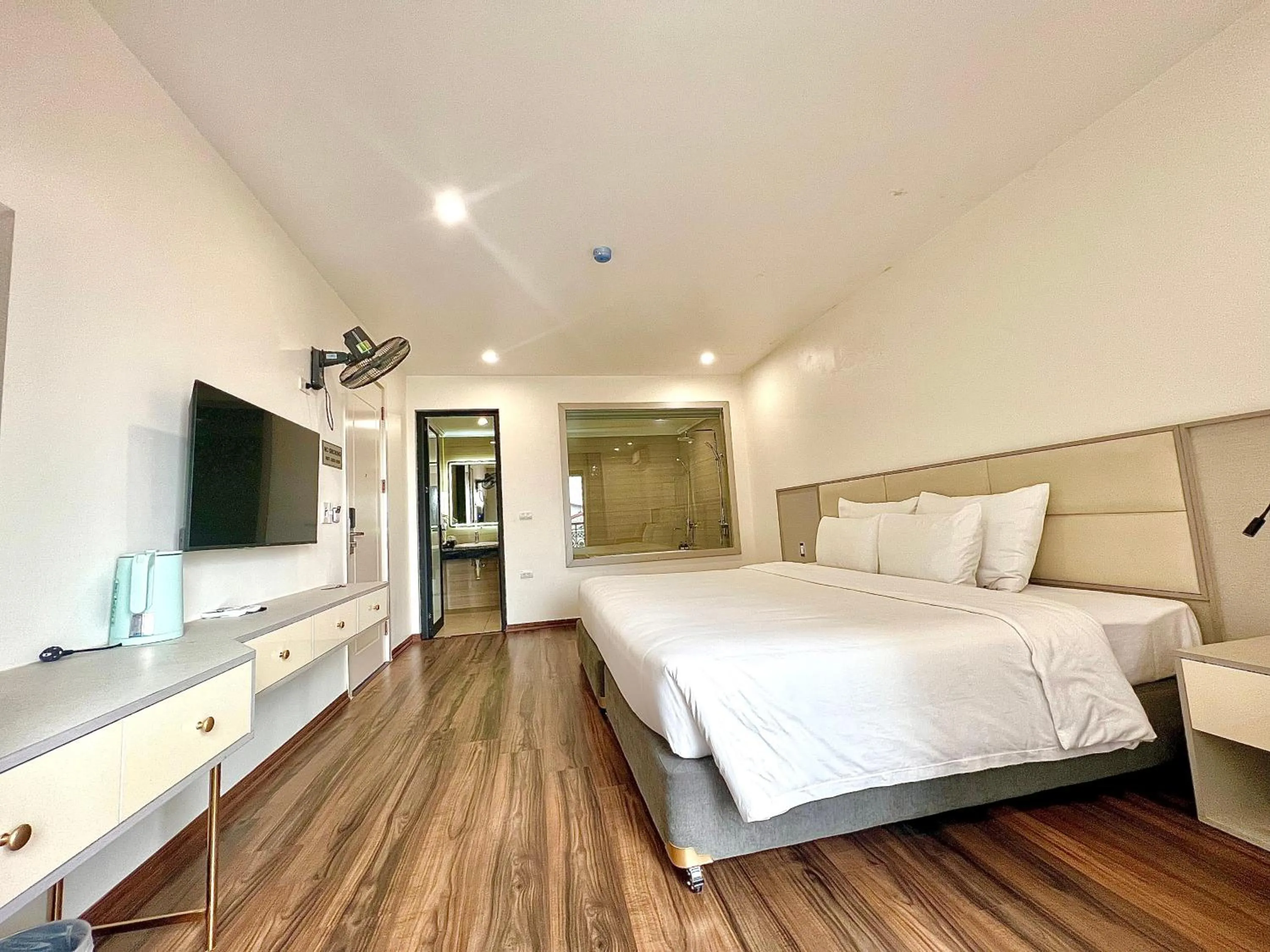 Bed in Grand Dragon Noi Bai Hotel