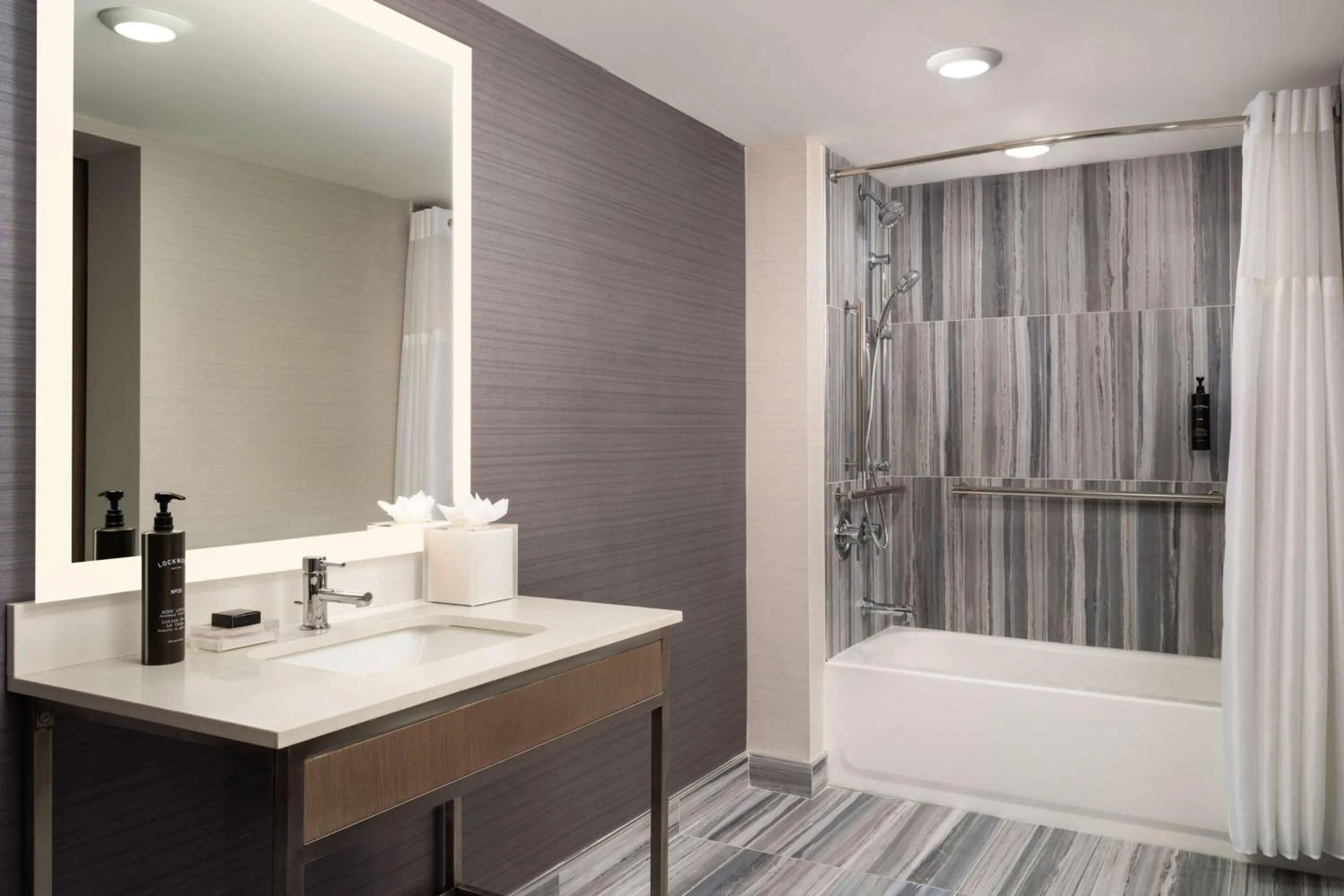 Bathroom in Hotel Lela Wilmington, Tapestry Collection By Hilton