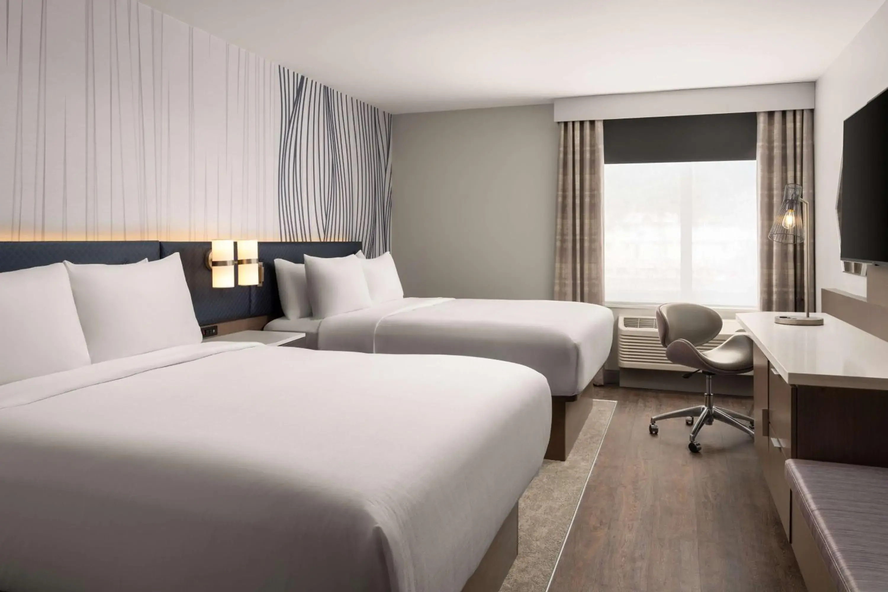 Queen Room with Two Queen Beds and Roll-In Shower - Disability Access in Hotel Lela Wilmington, Tapestry Collection By Hilton Queen Room with Two Queen Beds and Roll-In Shower - Disability Access in Hotel Lela Wilmington, Tapestry Collection By Hilton