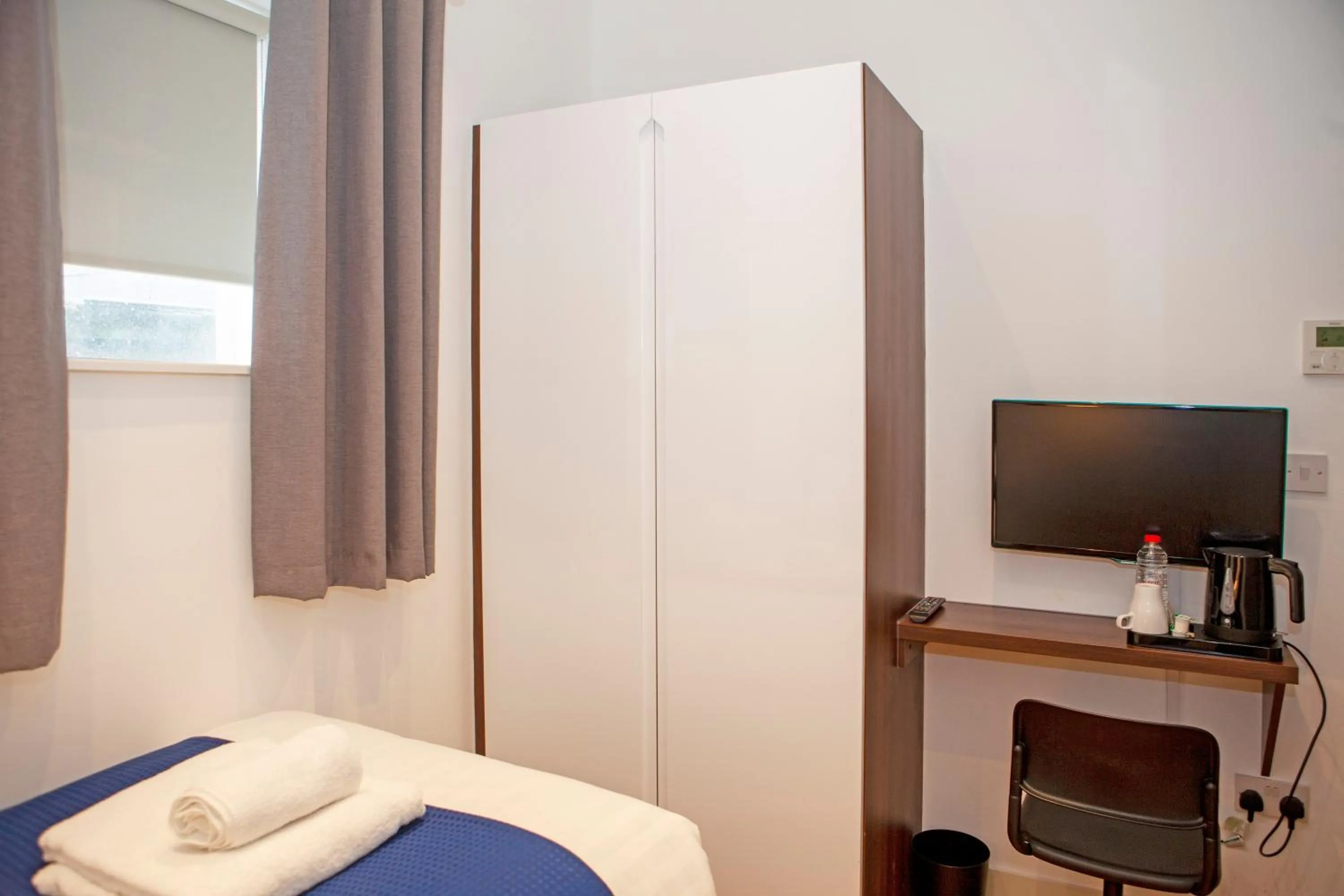 Bed in Putera Puteri Residence