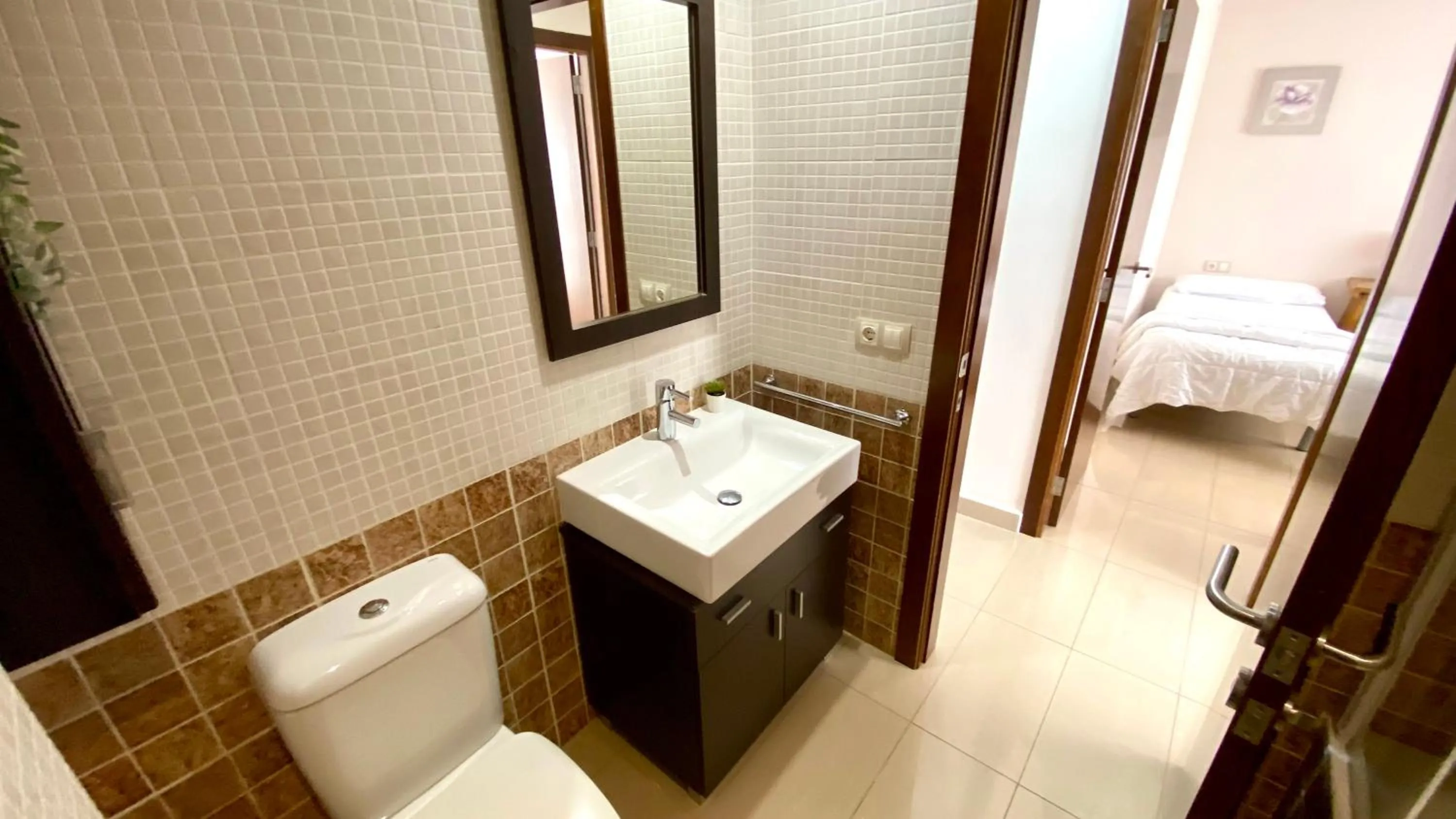 Bathroom, Bed in Apartamentos Carlton VyB