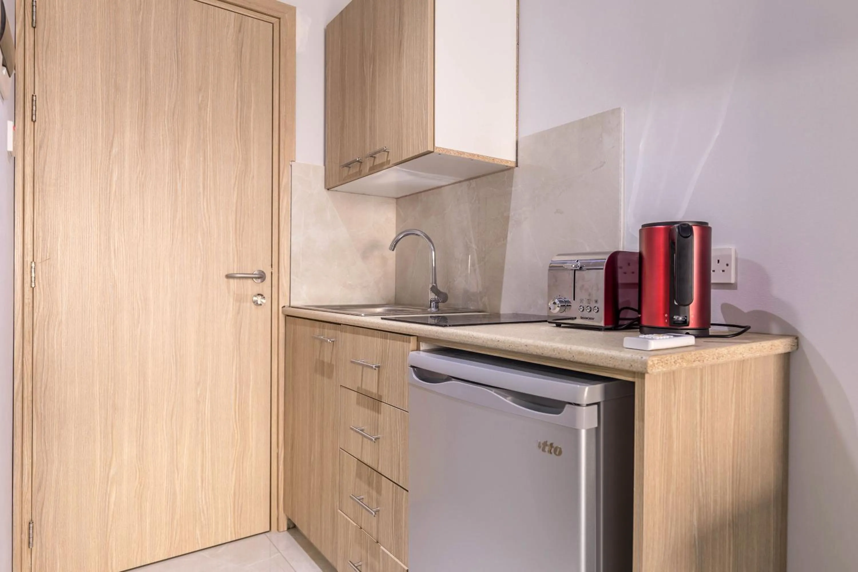 Kitchen or kitchenette in Paul Marie Hotel Apartments
