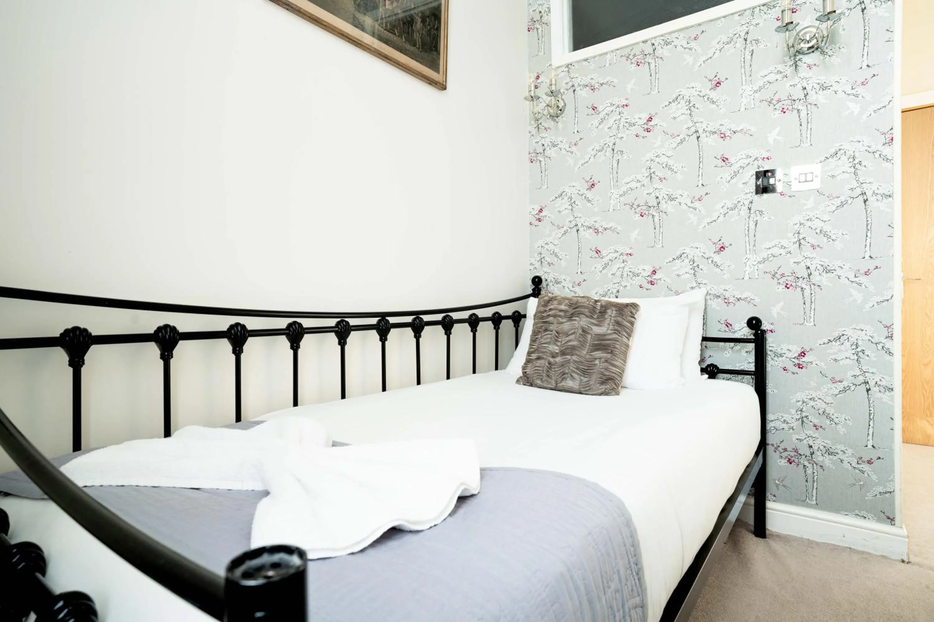 Bed in Lancaster Court Hotel