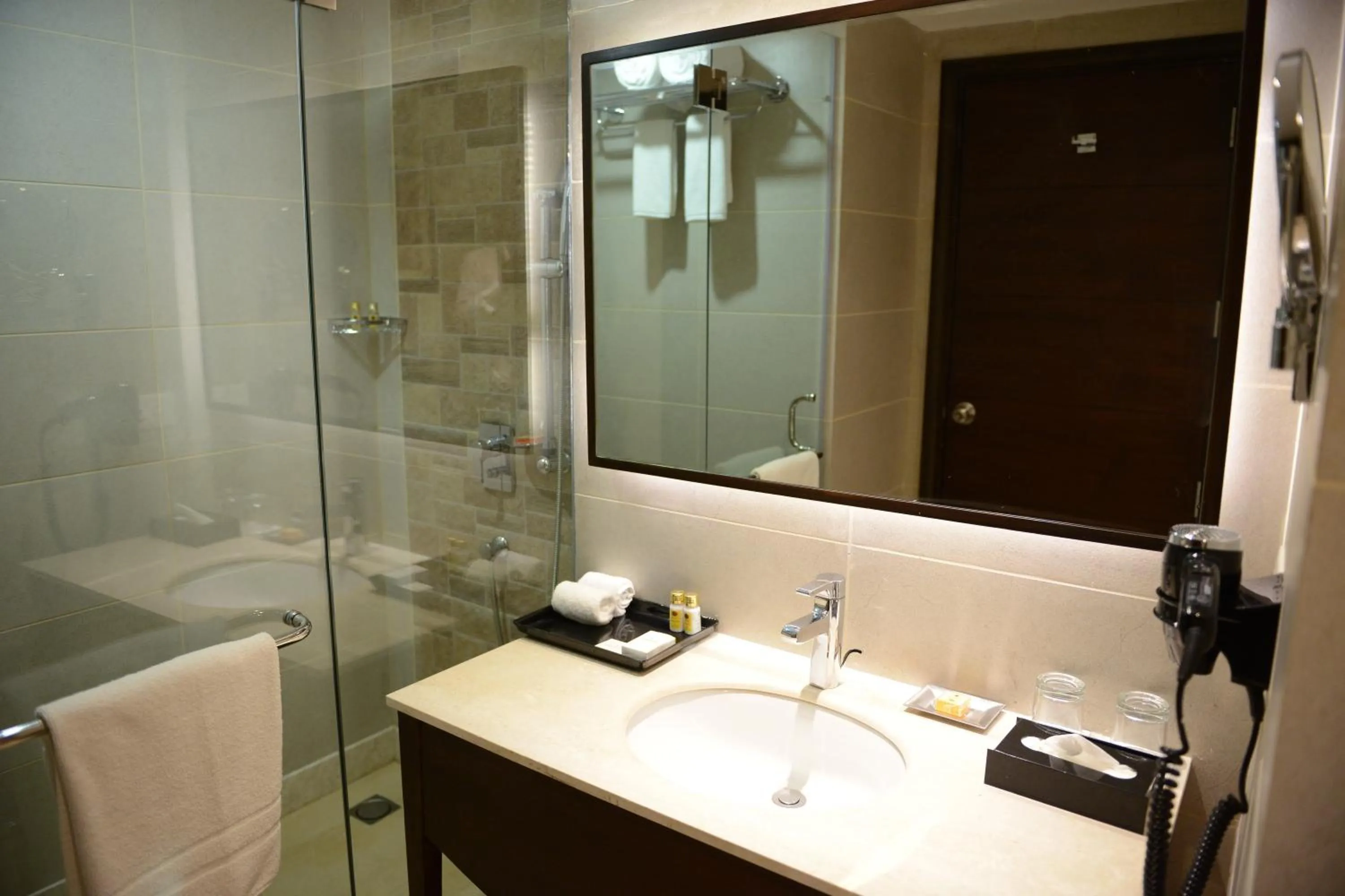 Bathroom in Country Inn & Suites by Radisson, Gurugram Sohna Road
