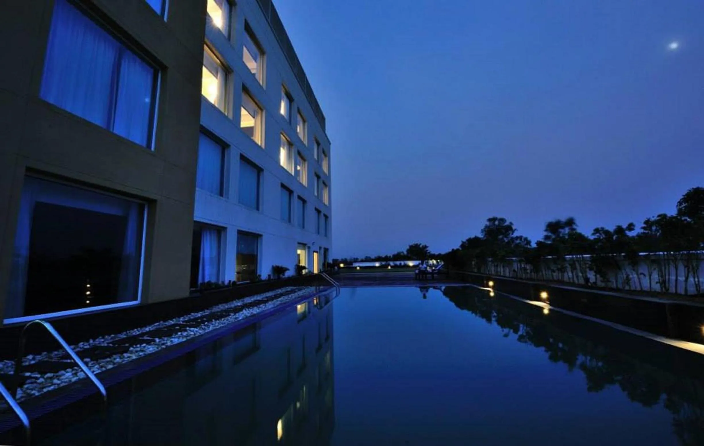 Swimming pool in Country Inn & Suites by Radisson, Gurugram Sohna Road