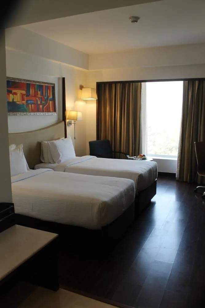 Bed in Gurmon Hotels Sohna Road Gurugram, a member of Radisson Individuals