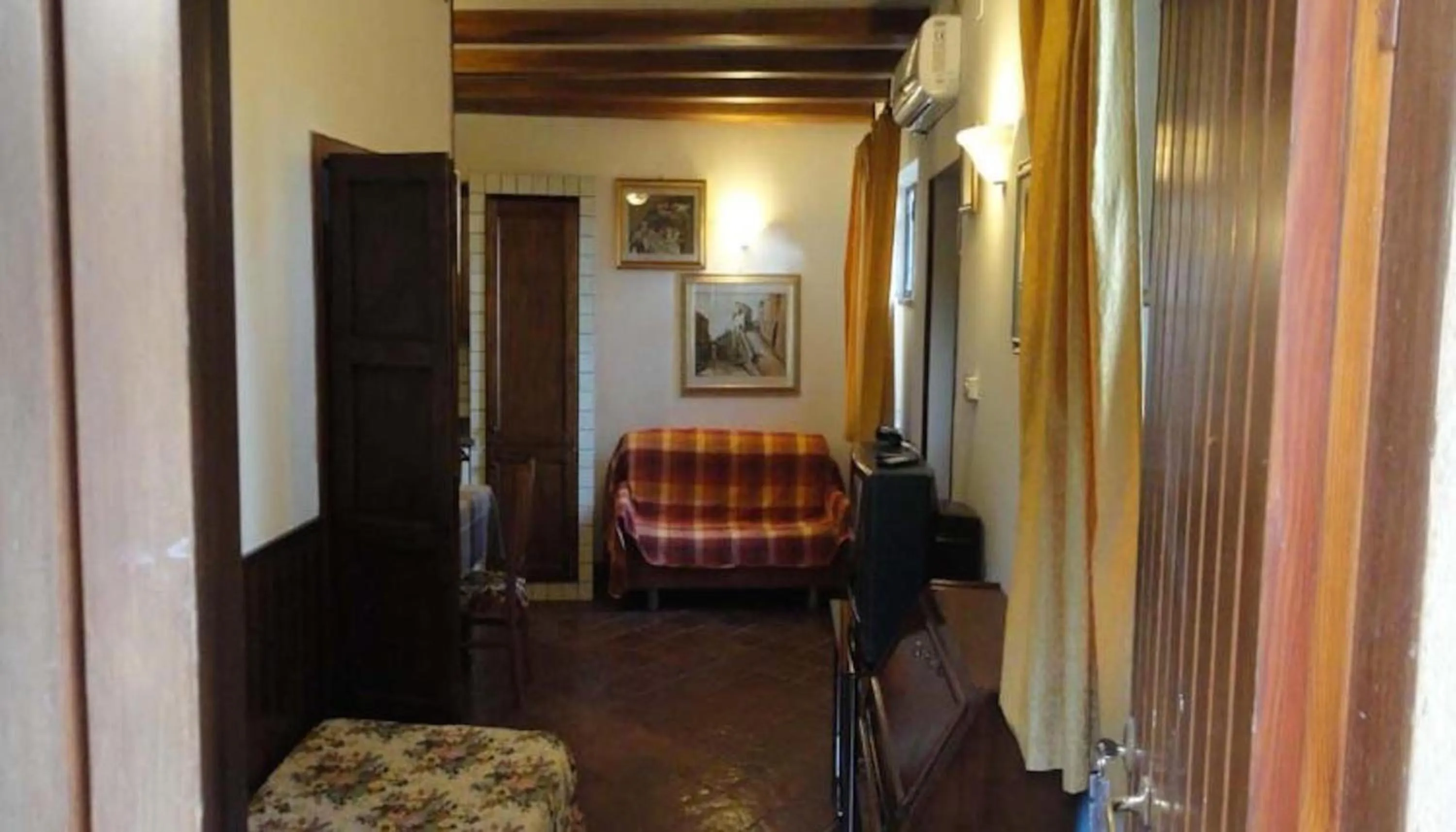 Living room, Bed in La Terrazza di Spello