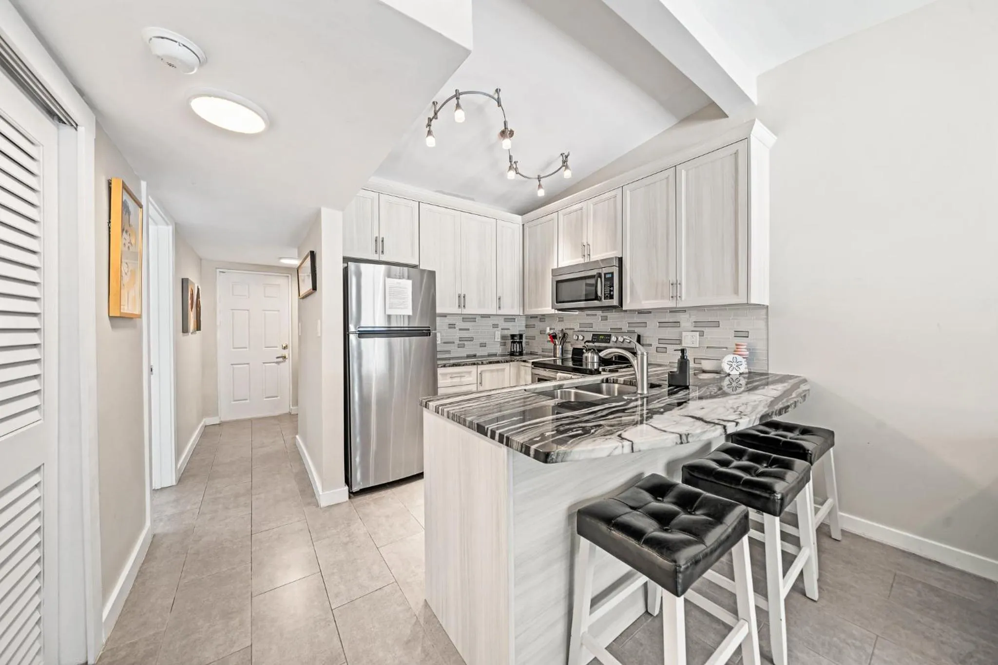 Kitchen or kitchenette in The Banana River Resort