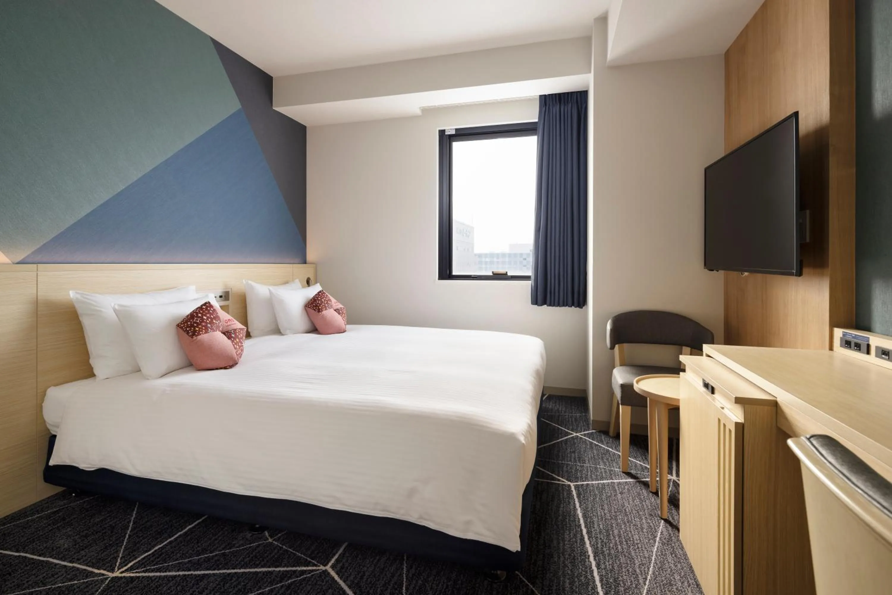 Bed in OMO5 Hakodate by Hoshino Resorts