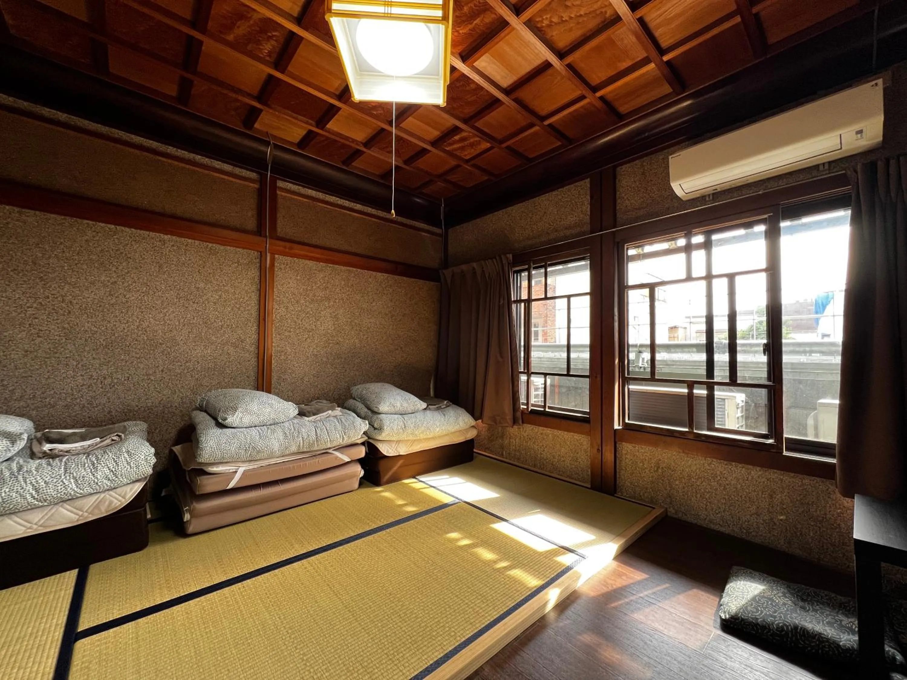 Bedroom, Bed in Hostel Miyagawa by Murasaki