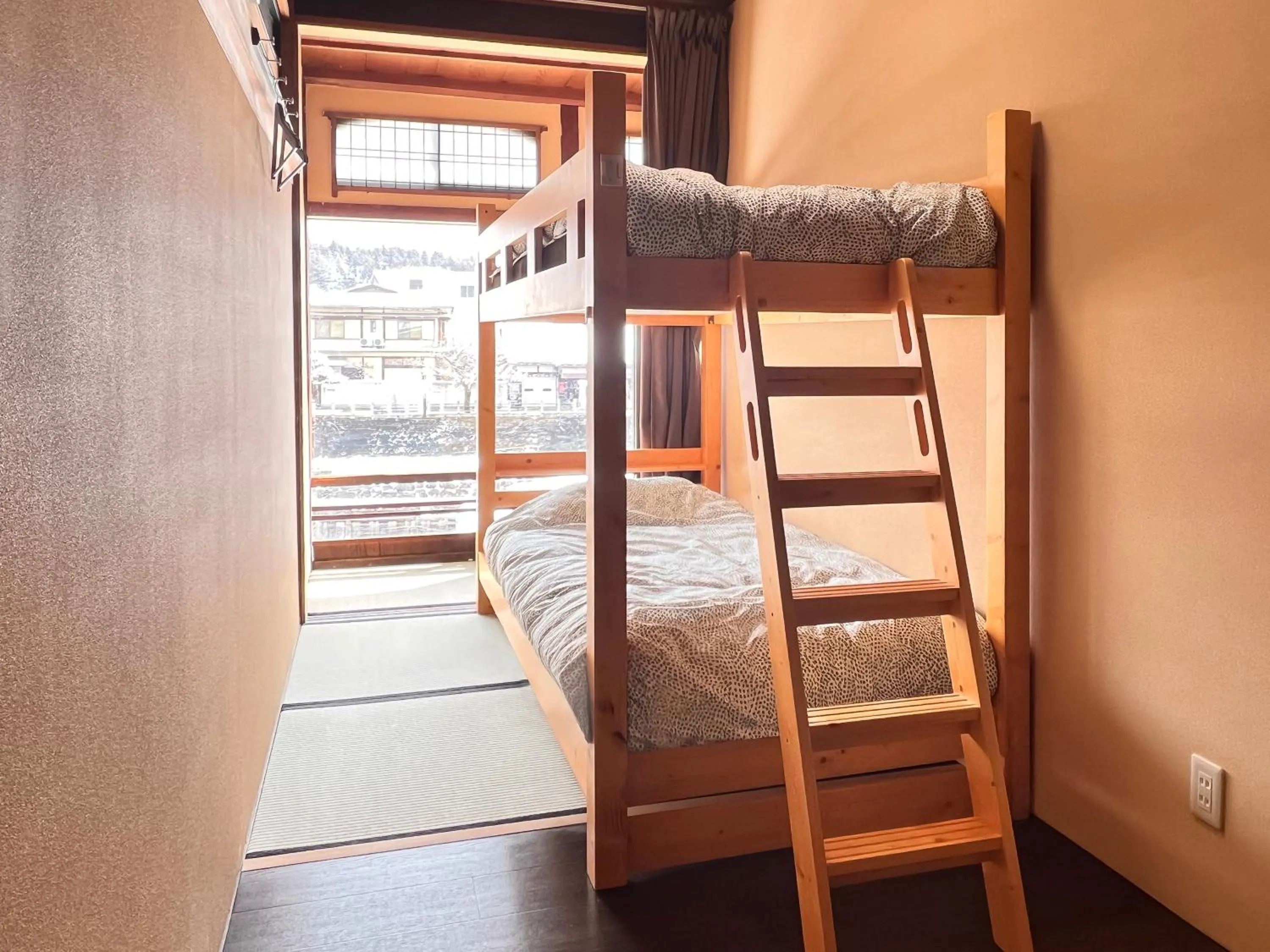 Bedroom, Bed in Hostel Miyagawa by Murasaki