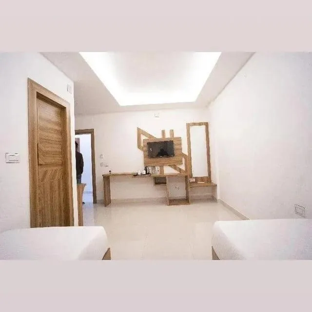 Bed in Hotel Shanti International