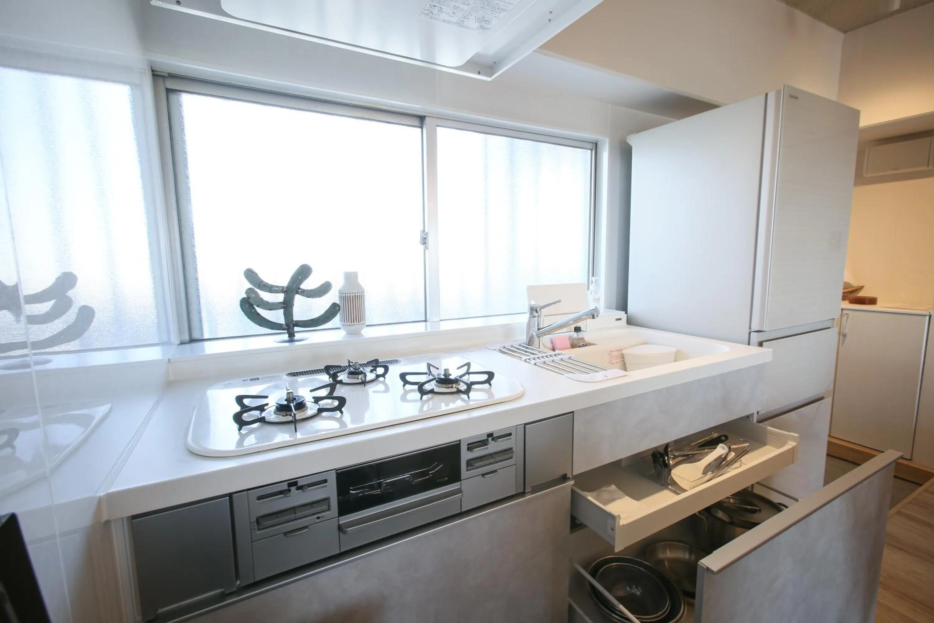 Kitchen or kitchenette in Sky Cuculu Ishigakijima