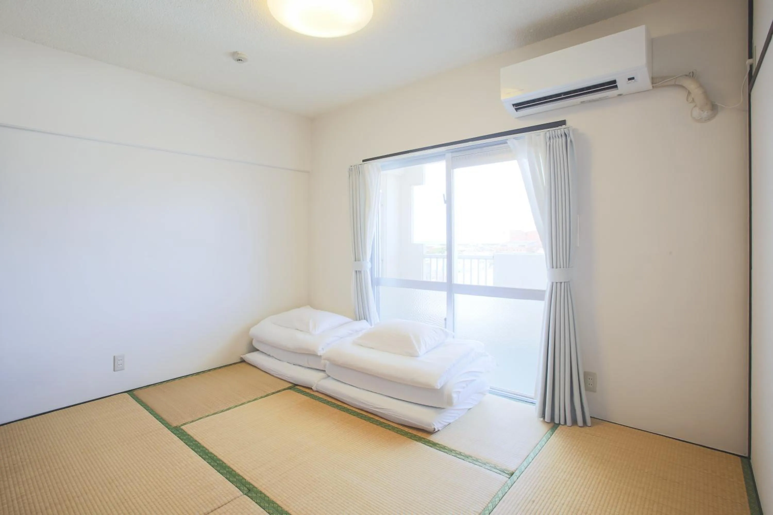 Bedroom, Bed in Sky Cuculu Ishigakijima