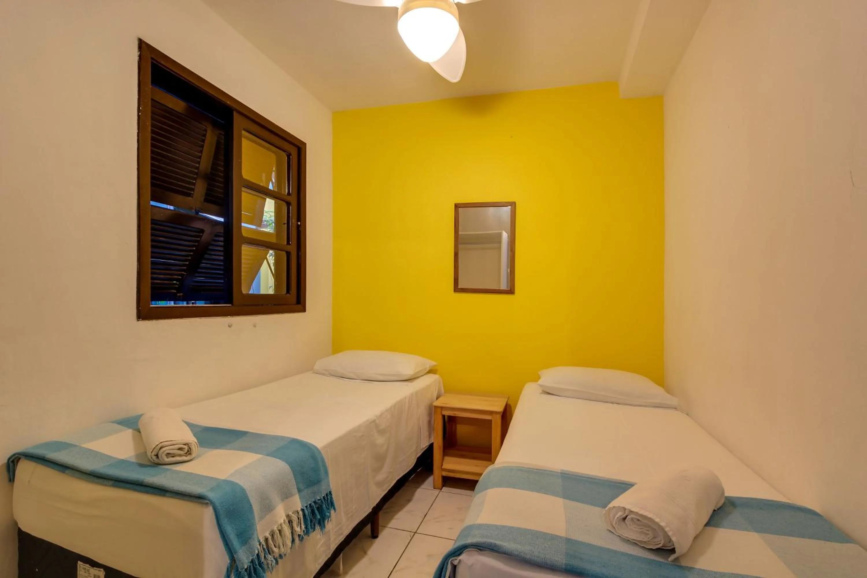 Bed in Residencial Vila do Sol, Apartamentos com pé na areia