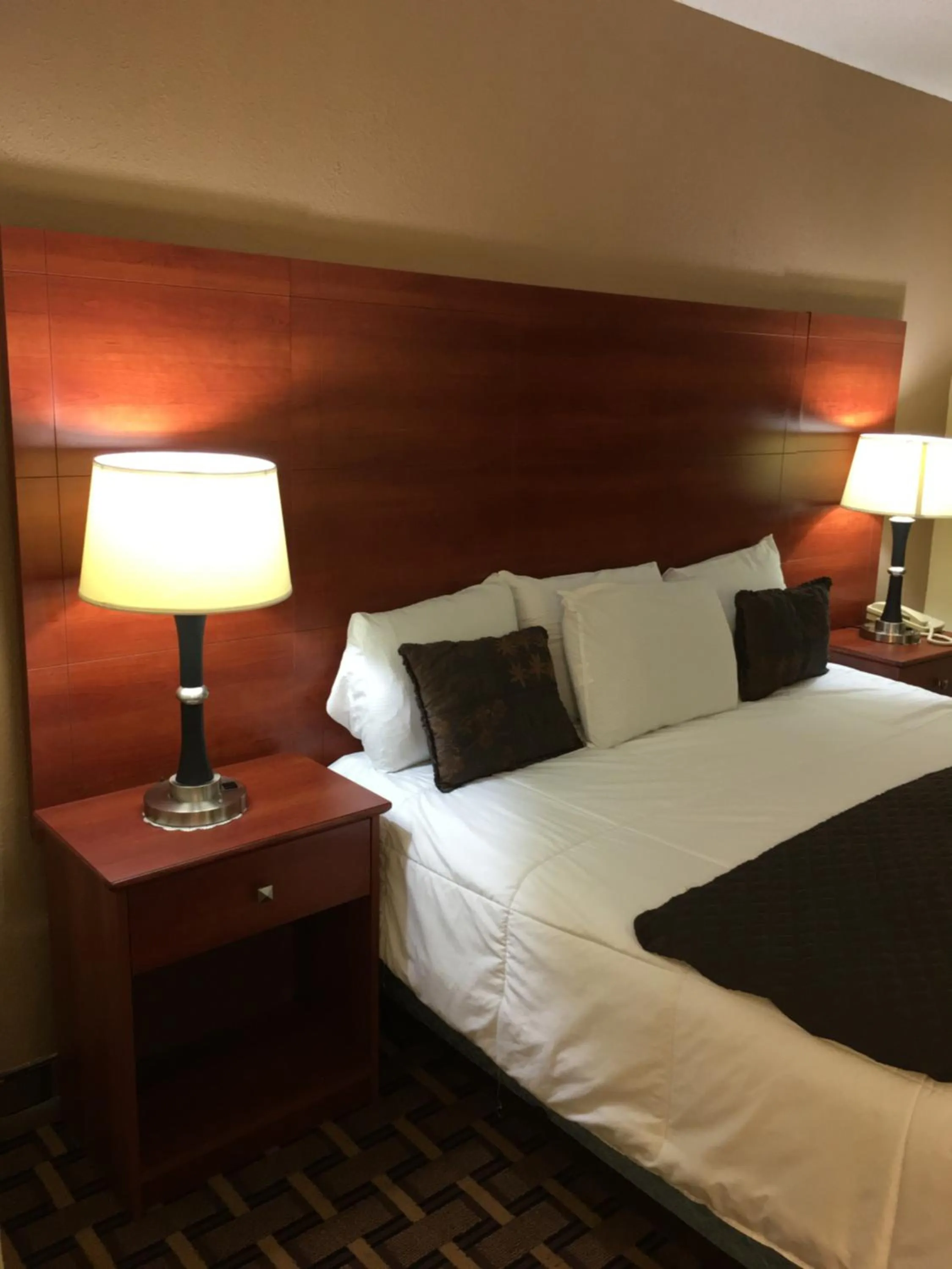 Decorative detail, Bed in Baymont by Wyndham Paducah