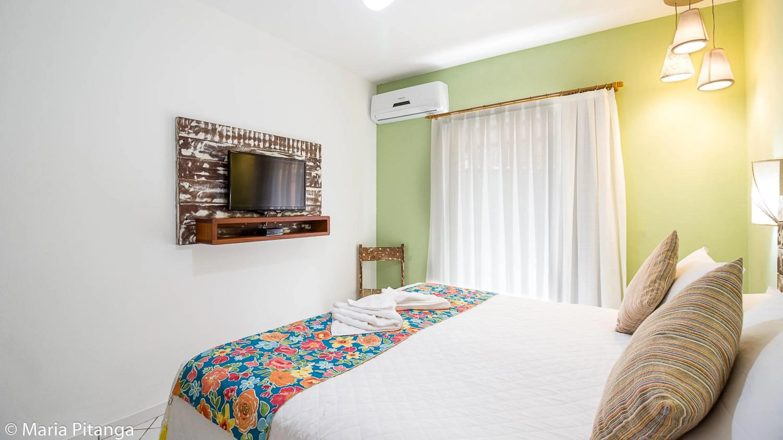 Bed in Pousada Maria Pitanga