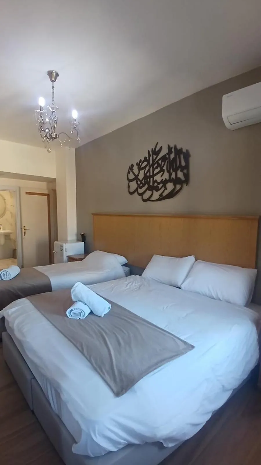 Bed in Moab Land Hotel