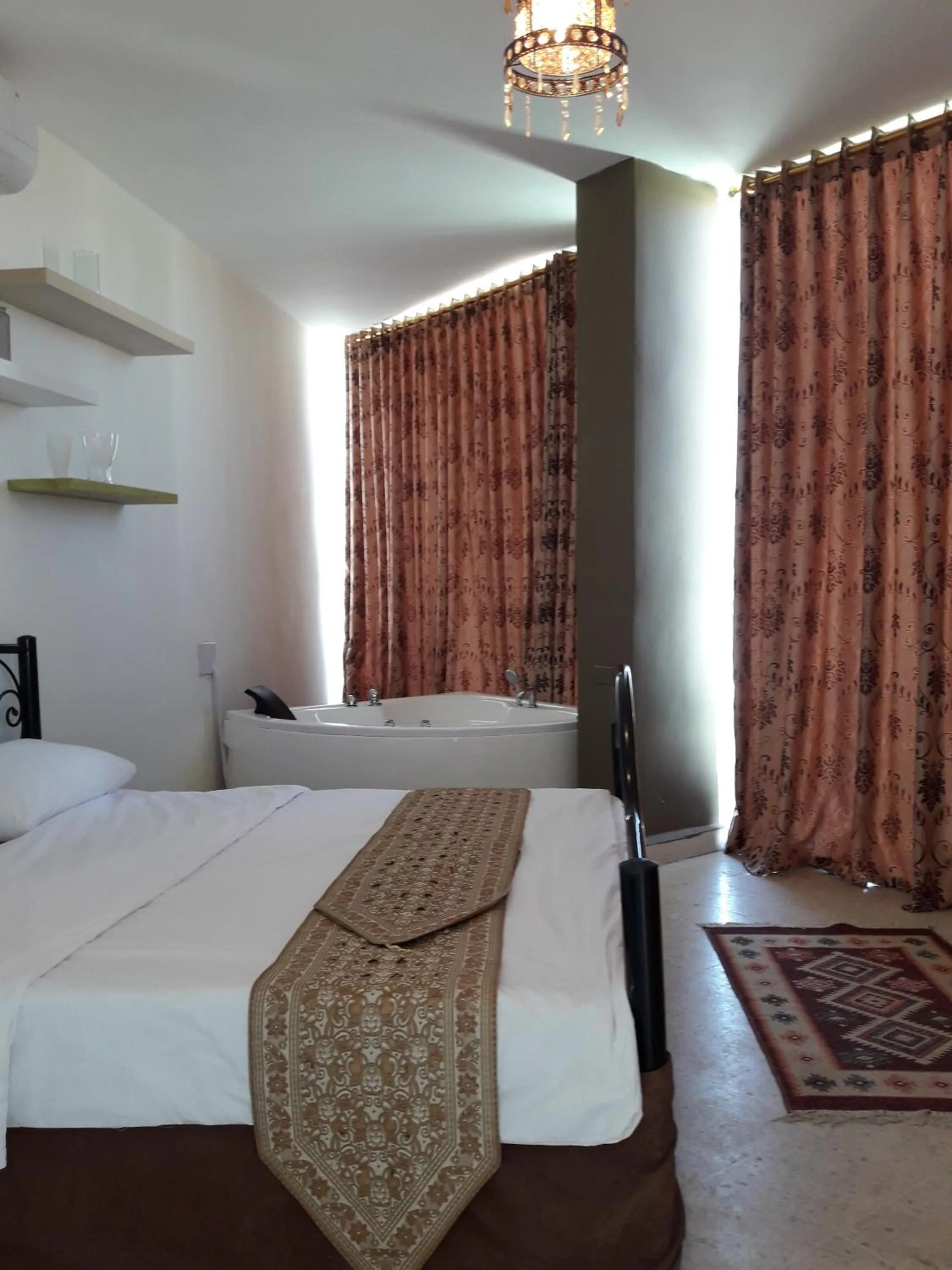 Bed in Moab Land Hotel