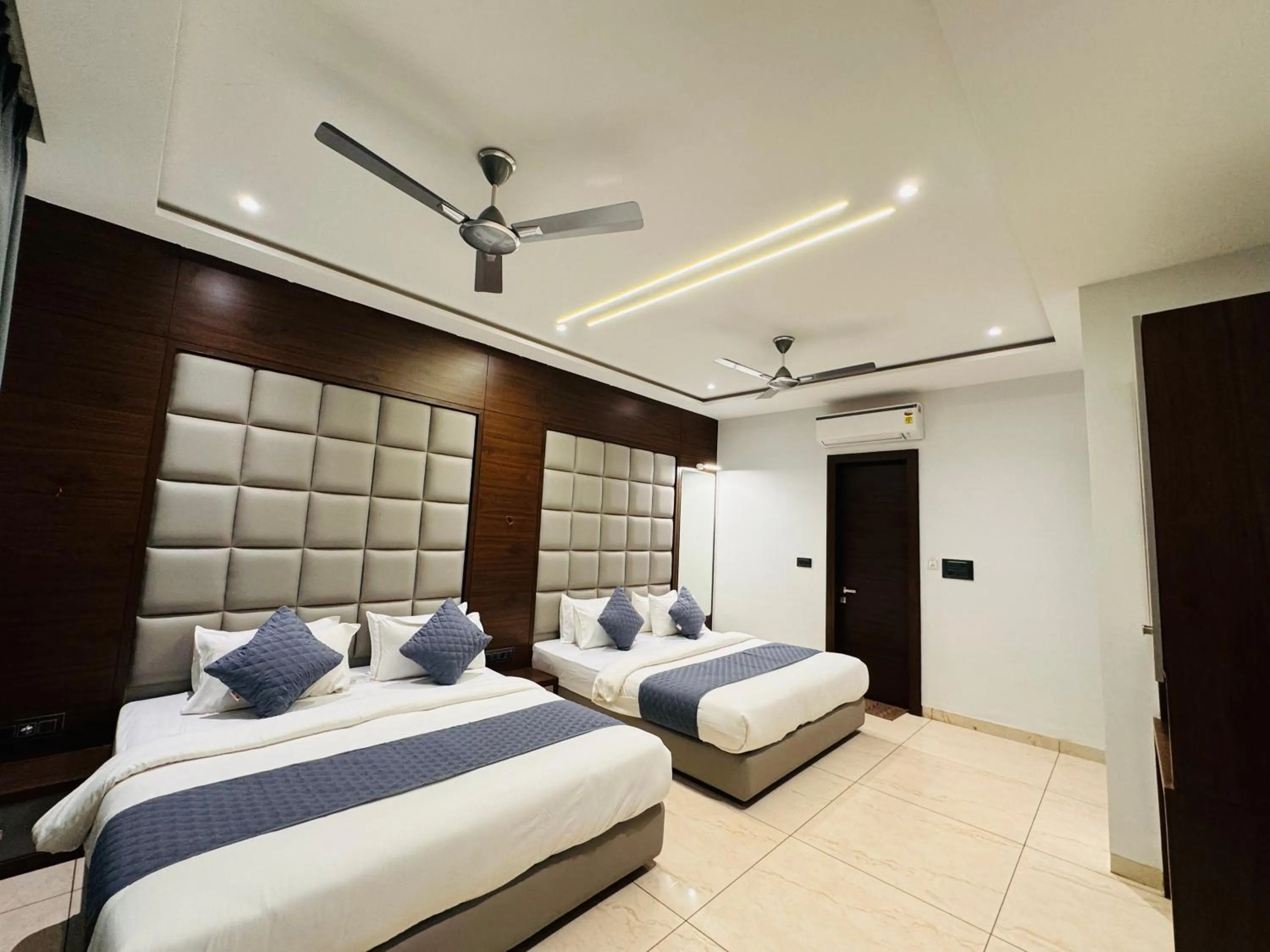 Bed in Hotel Rajdev INN