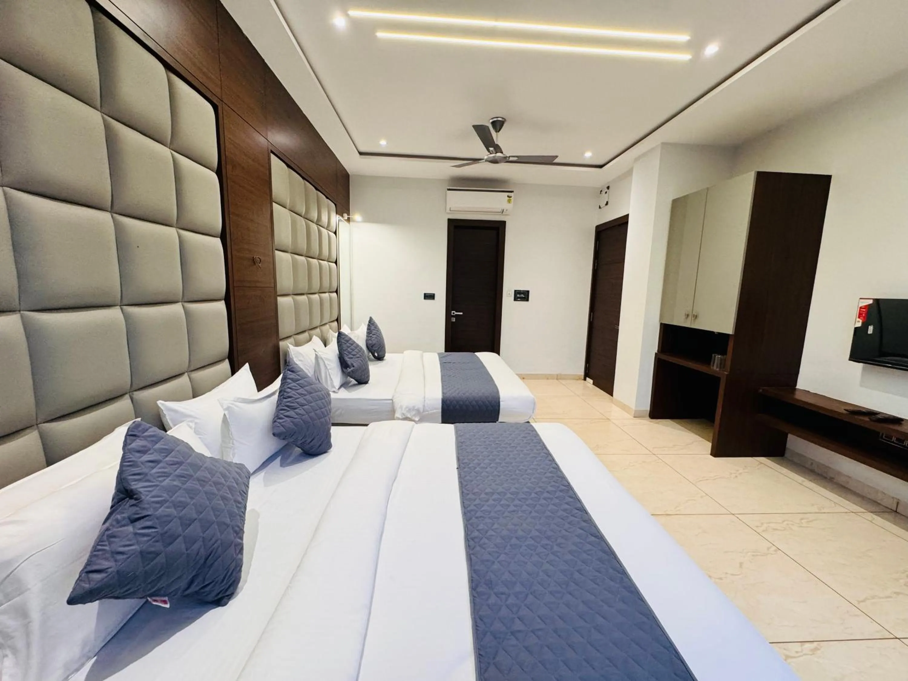 Photo of the whole room, Bed in Hotel Rajdev INN