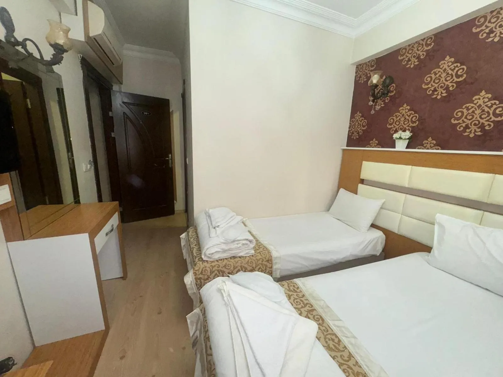 Photo of the whole room, Bed in Raimond Hotel