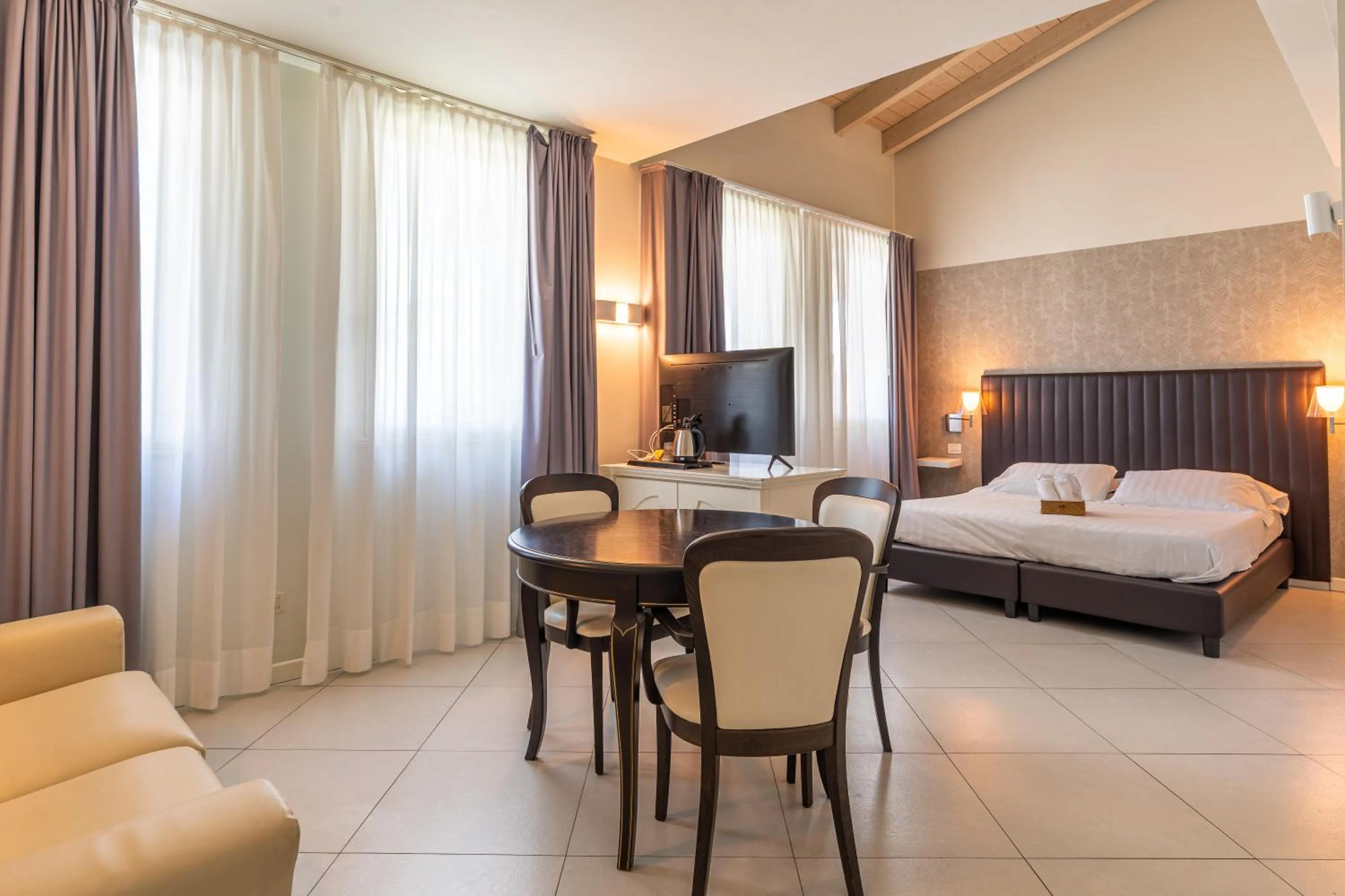 Living room, Bed in Monastero Resort & Spa - Garda Lake Collection