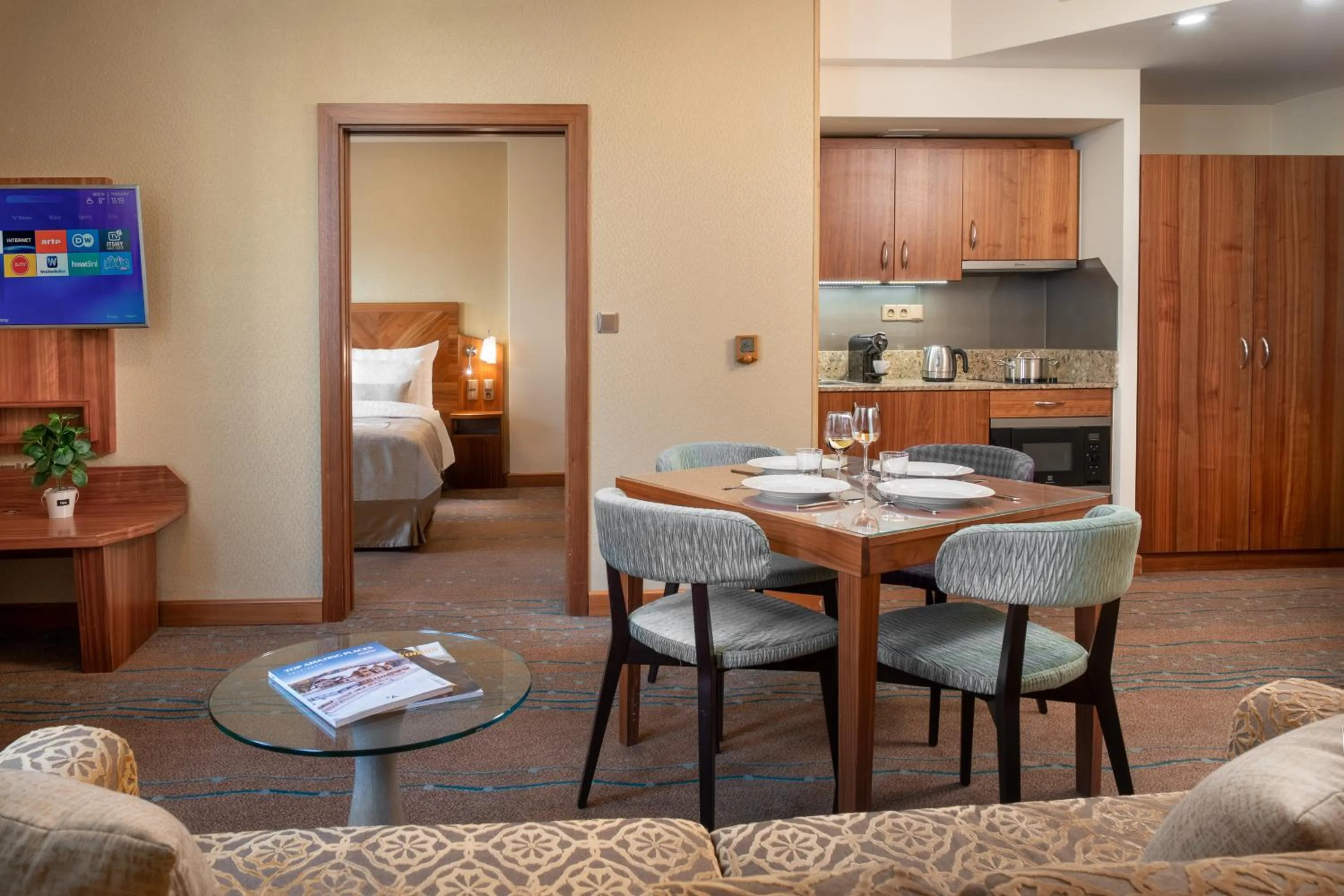 Kitchen or kitchenette, Bed in Crown Palace Apartments by Adrez