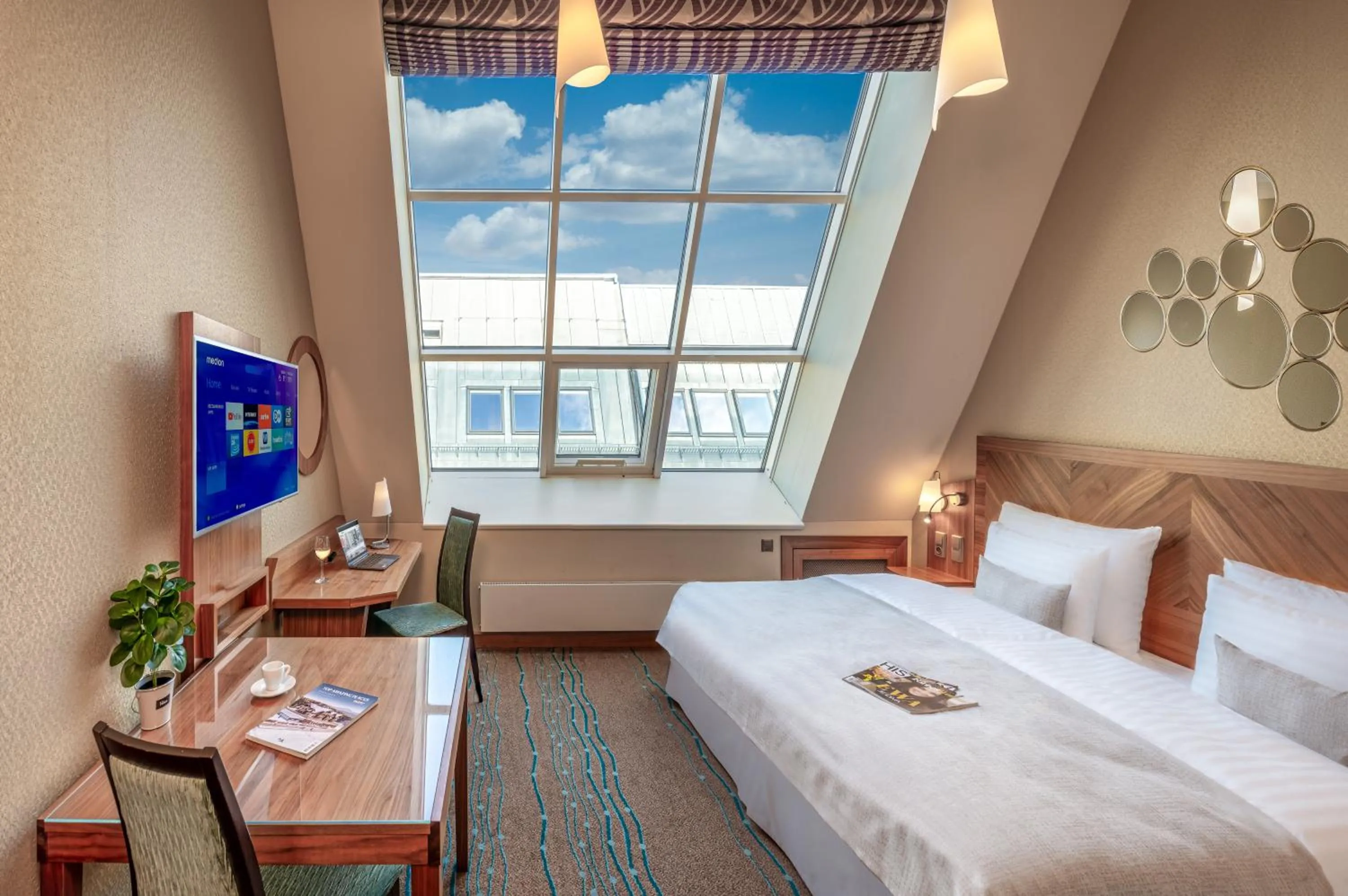 Bed in Crown Palace Apartments by Adrez