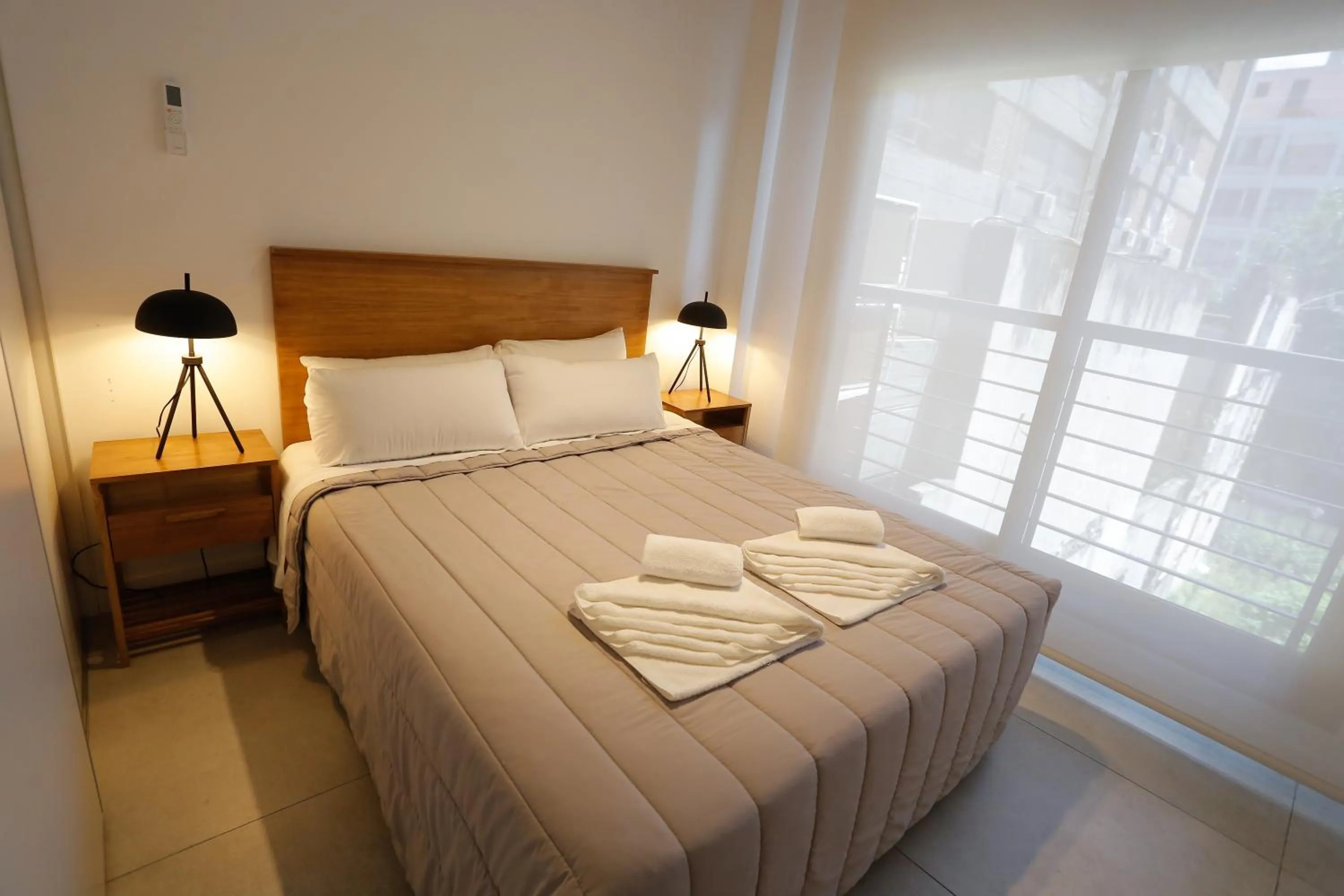 Bed in OWN Belgrano Studios & Suites