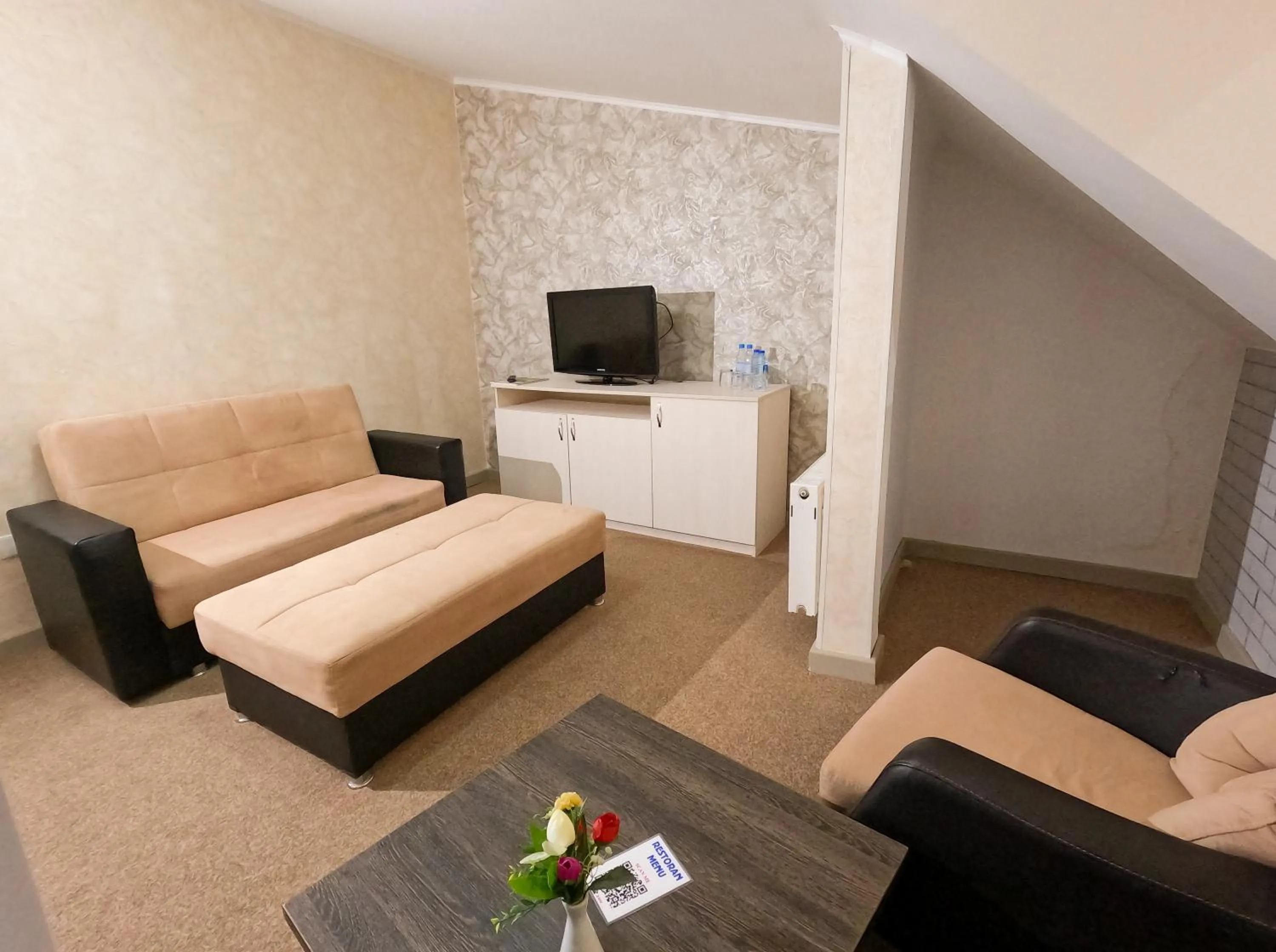 Communal lounge/ TV room, Bed in Gabala Yeddi Gozel Hotel