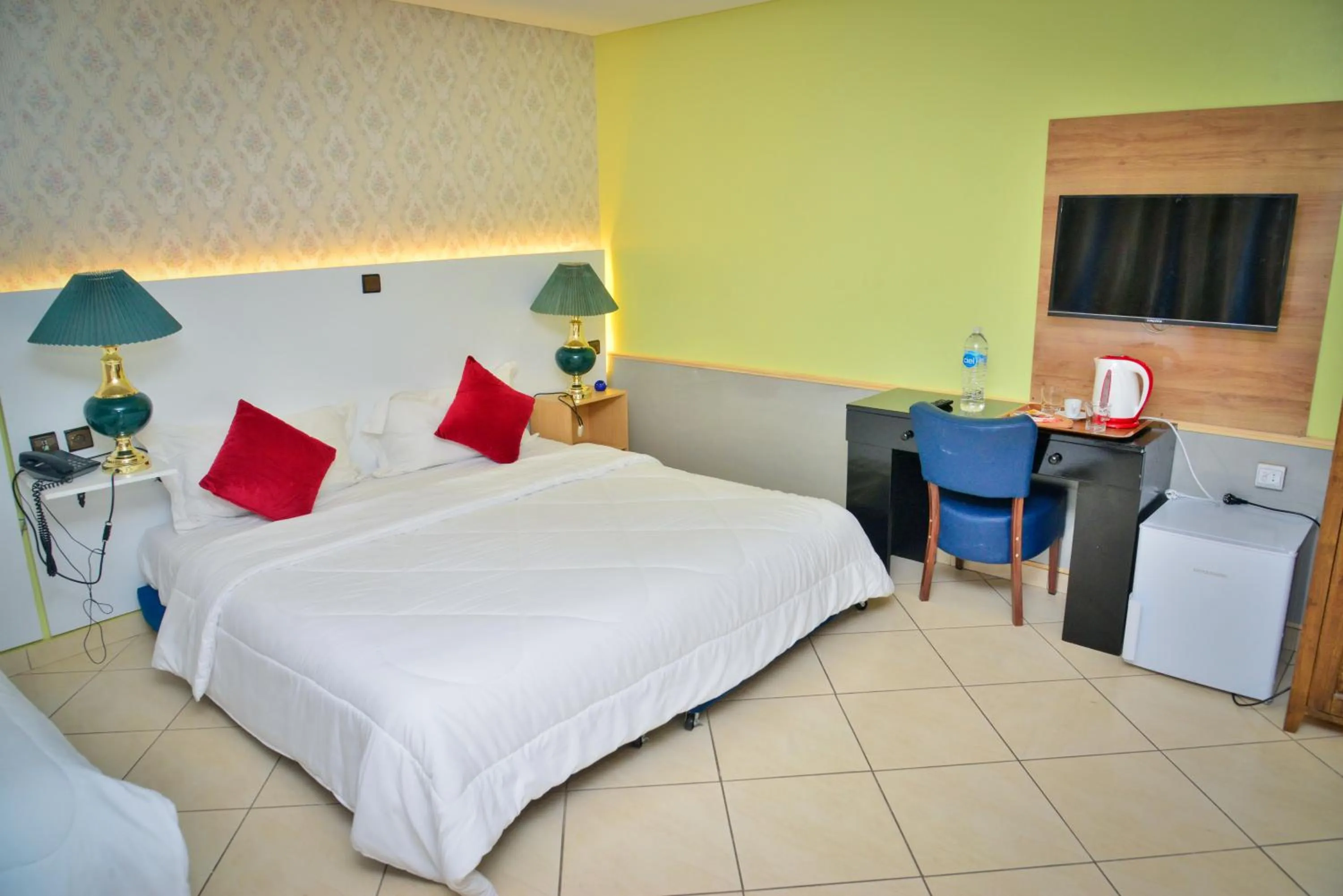 Seating area, Bed in Free Zone Hotel