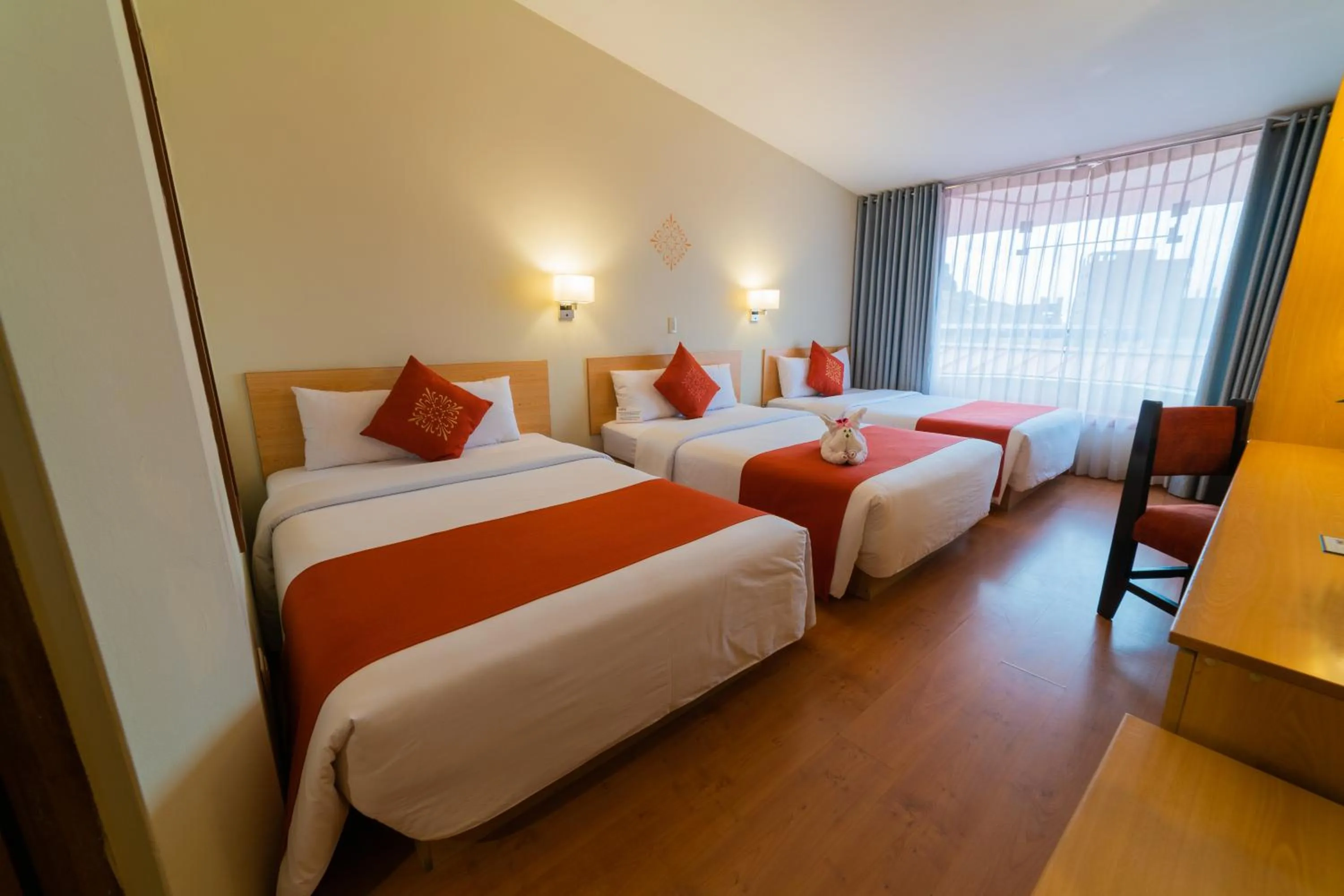 Photo of the whole room, Bed in Lake Titicaca Hotel