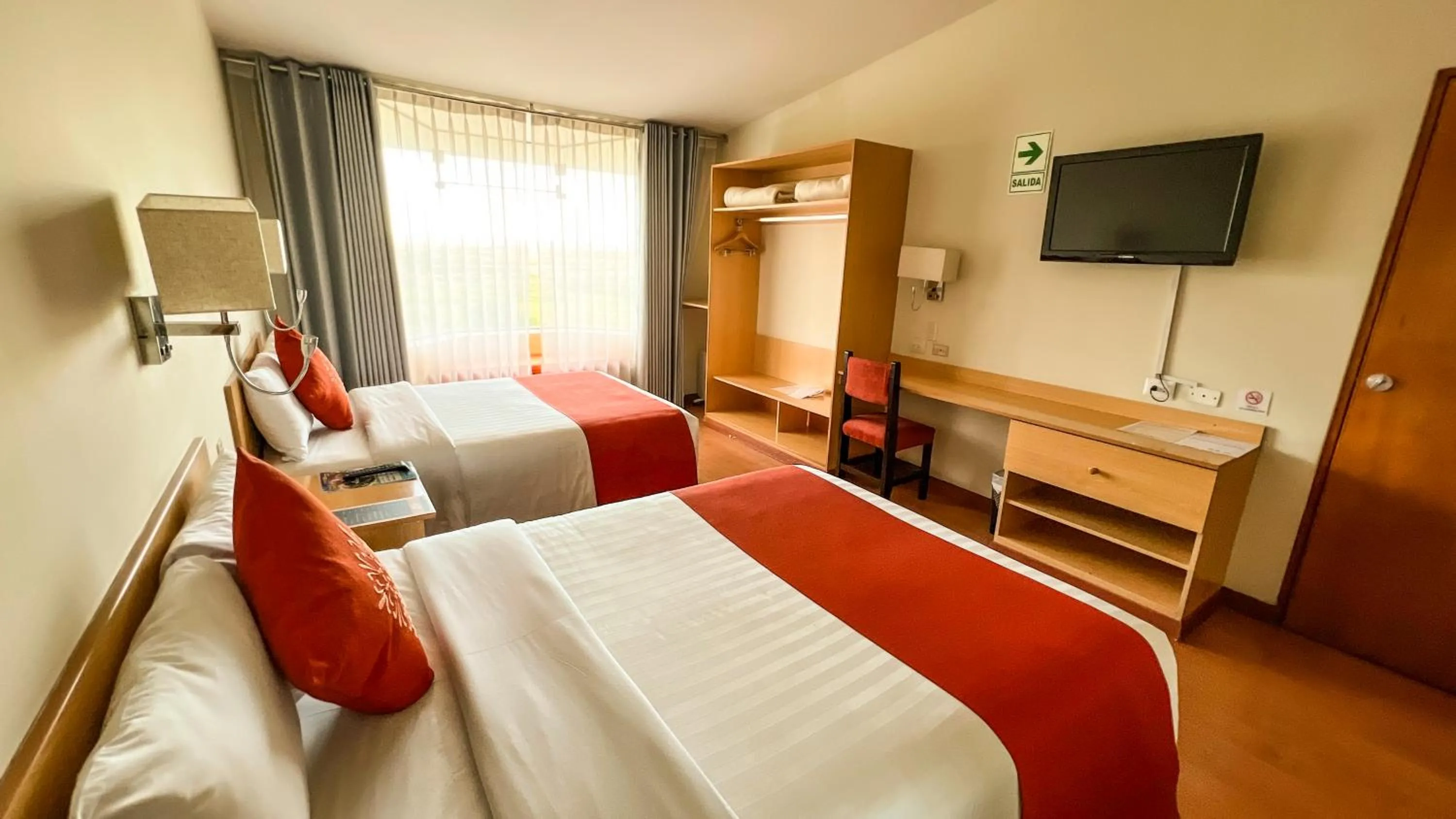 Photo of the whole room, Bed in Lake Titicaca Hotel