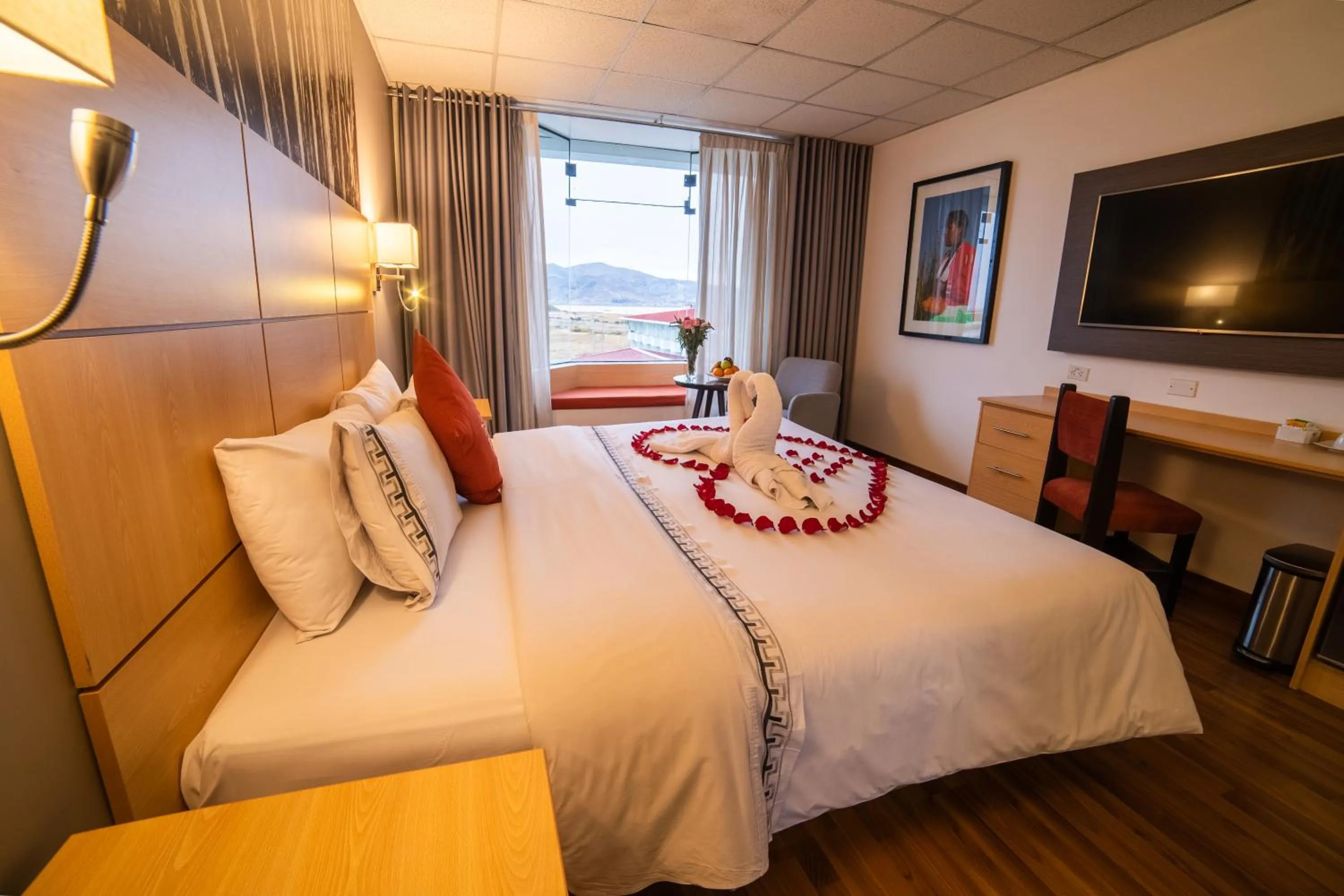 Photo of the whole room, Bed in Lake Titicaca Hotel