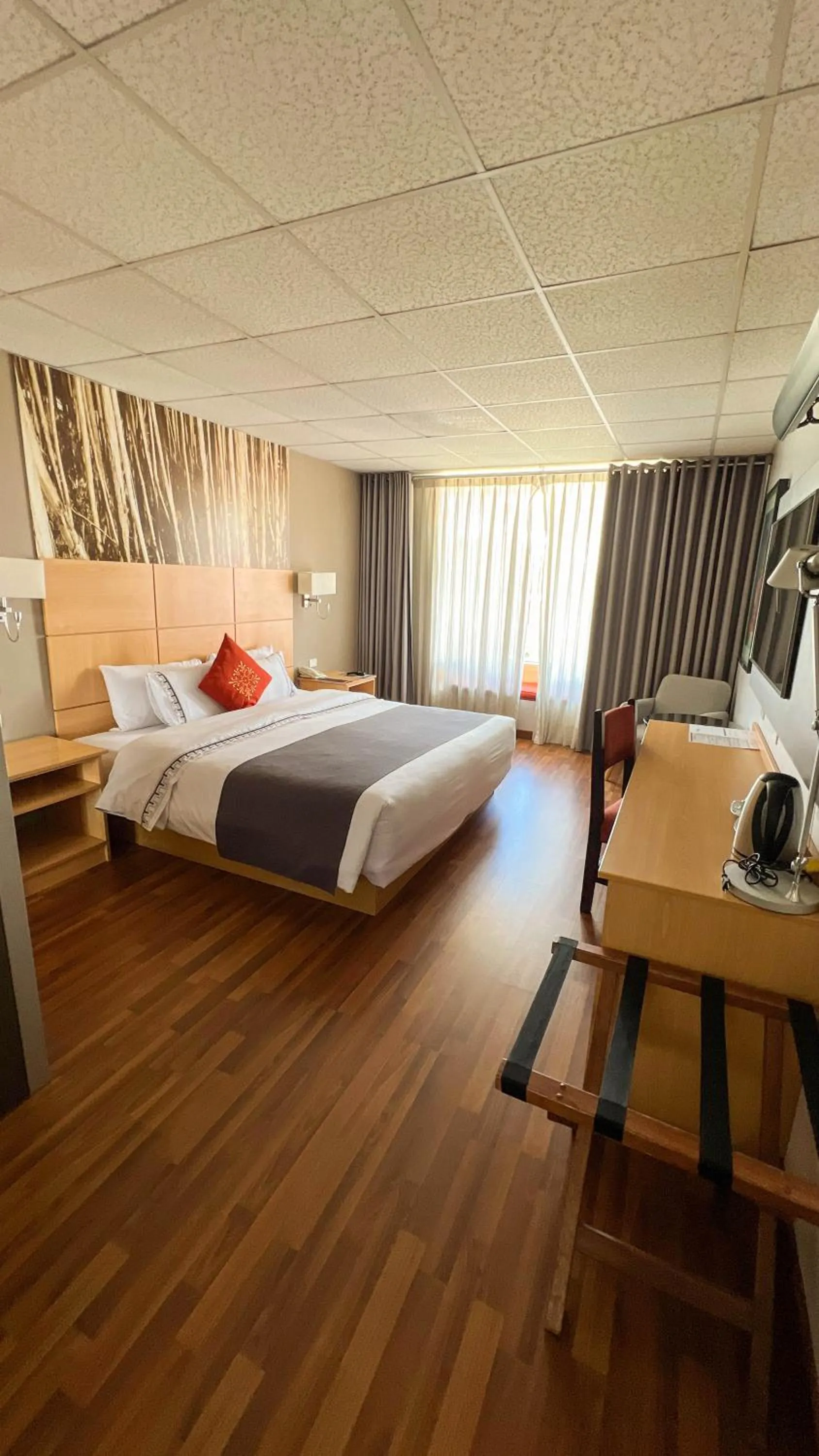 Photo of the whole room, Bed in Lake Titicaca Hotel